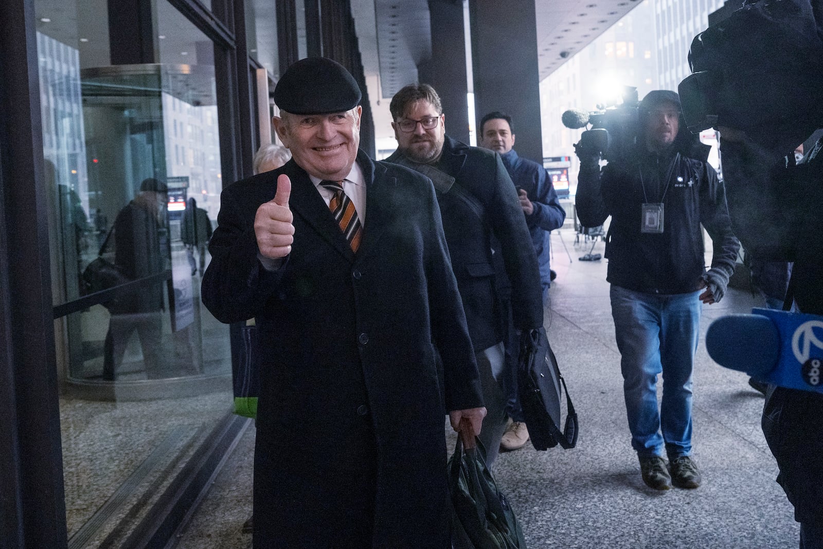 Michael McClain, a longtime confidant to former Illinois House Speaker Michael Madigan, walks out of the Dirksen Federal Courthouse in Chicago, Wednesday, Feb. 12, 2025. (Tyler Pasciak LaRiviere/Chicago Sun-Times via AP)