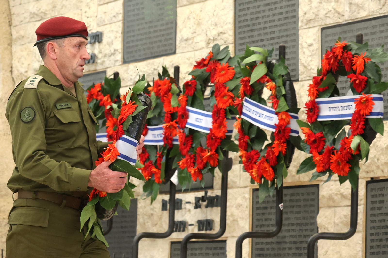 FILE - Chief of the General Staff Lieutenant-General Herzi Halevi places a wreath during a memorial ceremony marking the Hebrew calendar anniversary of the Hamas attack on October 7 last year, at the Mount Herzl military cemetery in Jerusalem, Israel Sunday Oct. 27, 2024. (Gil Cohen-Magen/Pool Photo via AP, File)