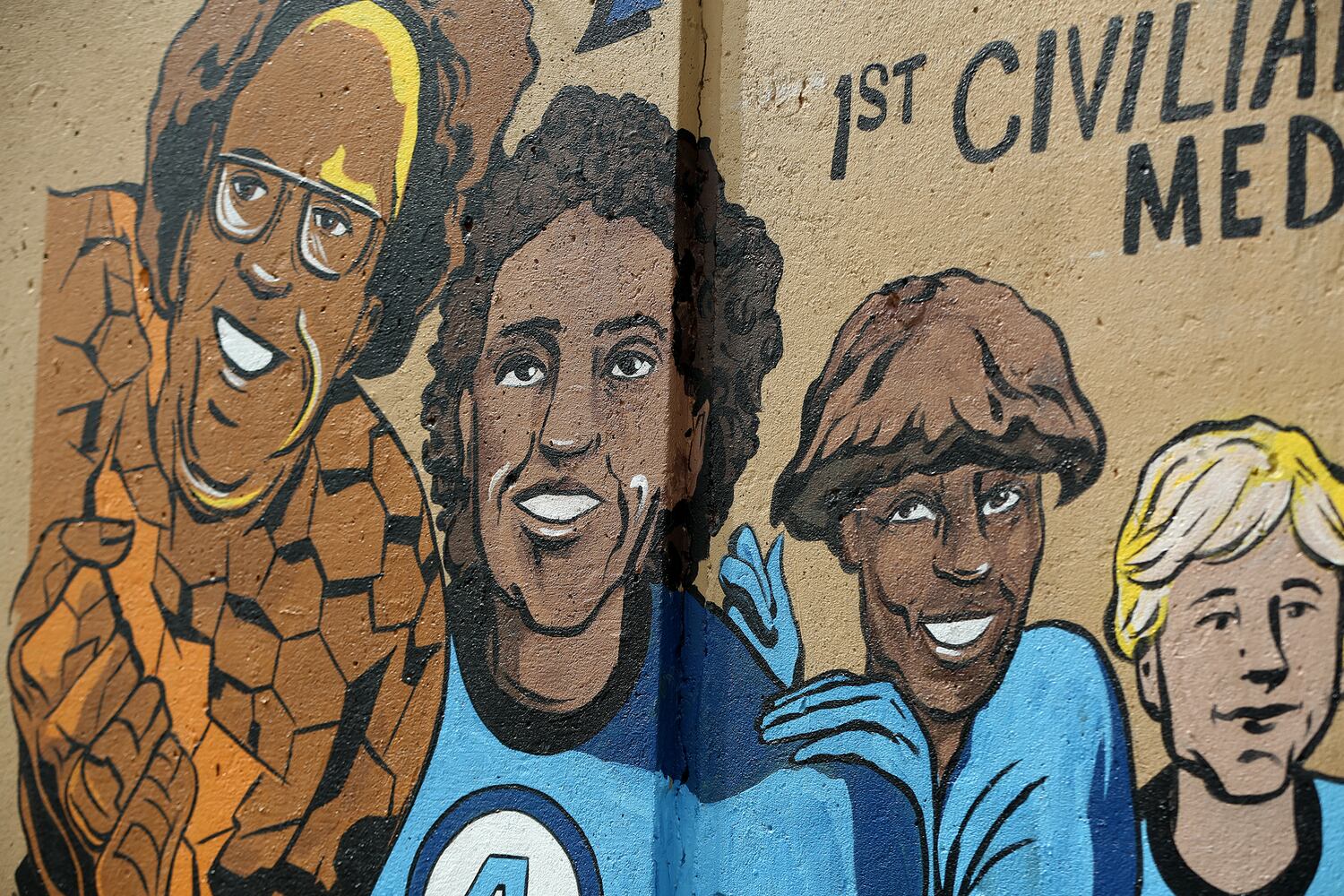 PHOTOS: Comic book style mural honors Dayton Fire Department history