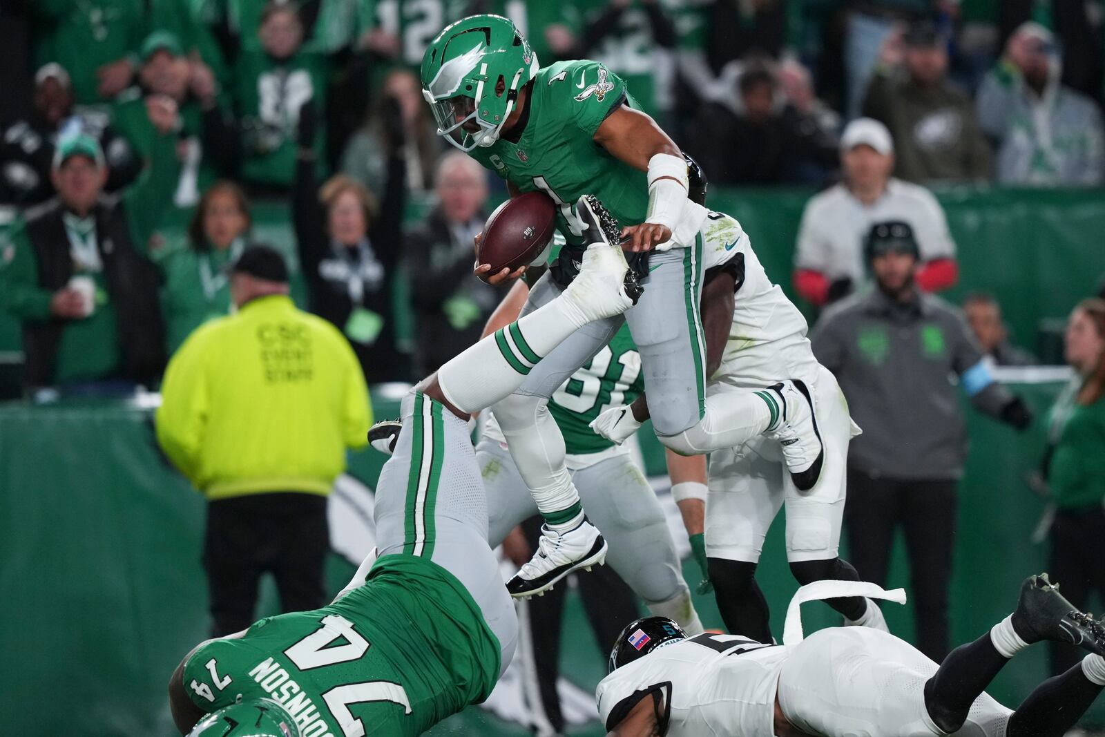 Philadelphia Eagles quarterback Jalen Hurts (1) scores a touchdown during the second half of an NFL football game against the Jacksonville Jaguars on Sunday, Nov. 3, 2024, in Philadelphia. (AP Photo/Matt Slocum)