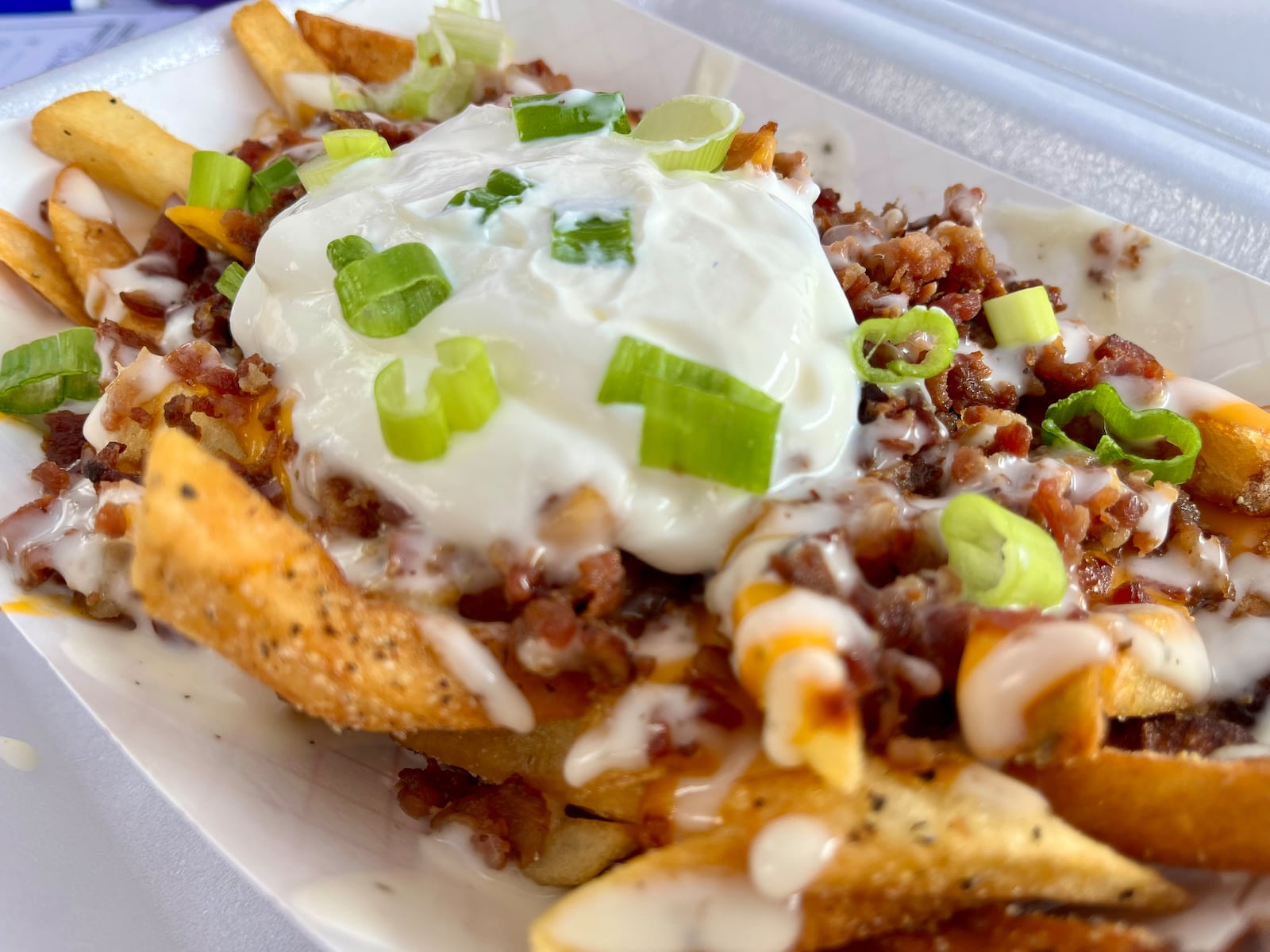 Just over a dozen food trucks on Saturday, Aug. 3, 2024 put their spin on what it means to have bacon at the forefront during Bacon Fest at the Fraze Pavilion in Kettering. NATALIE JONES/STAFF