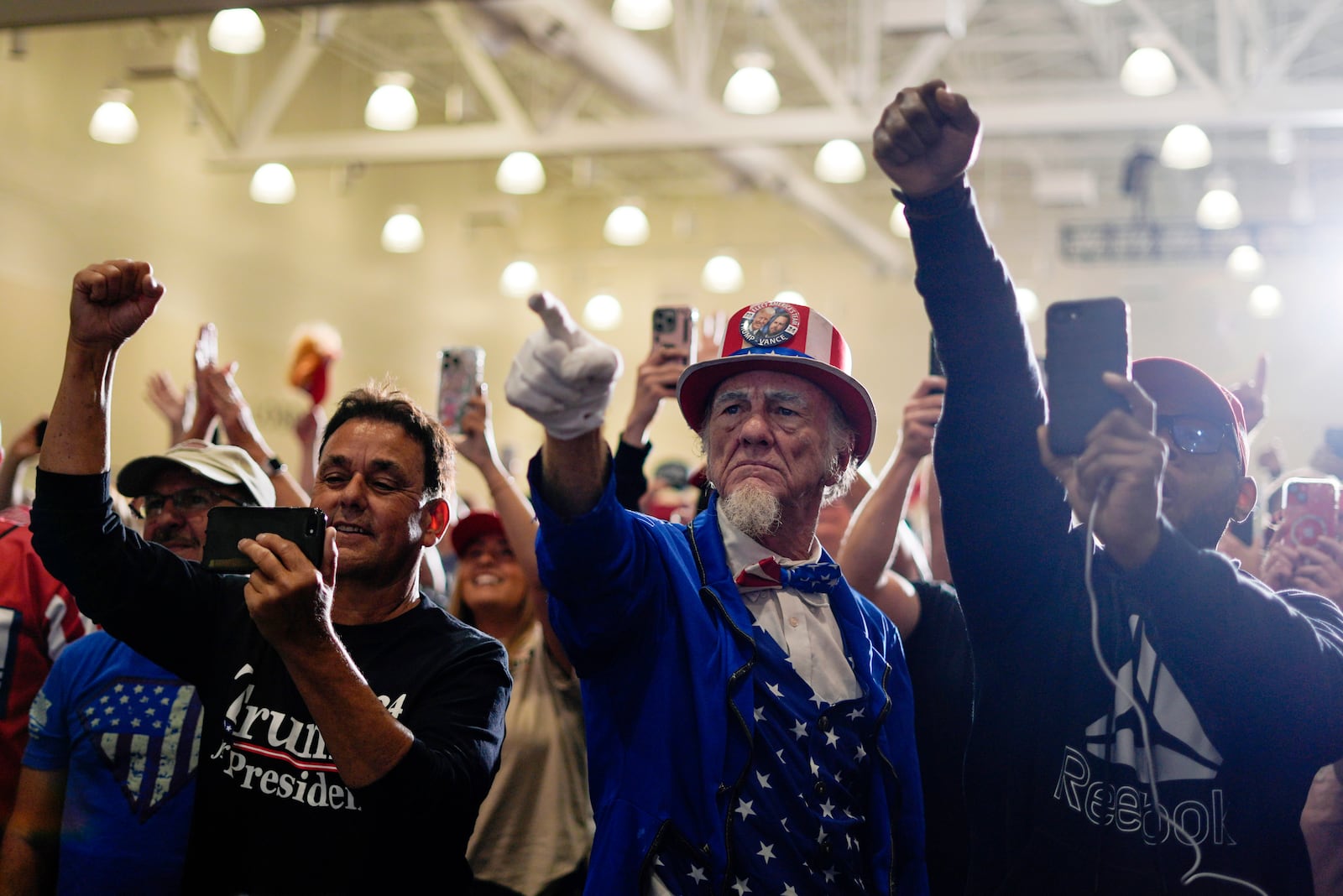 Supporters cheer as Republican presidential nominee former President Donald Trump speaks during a campaign event, Sunday, Sept. 29, 2024, in Erie, Pa. (AP Photo/Matt Rourke)