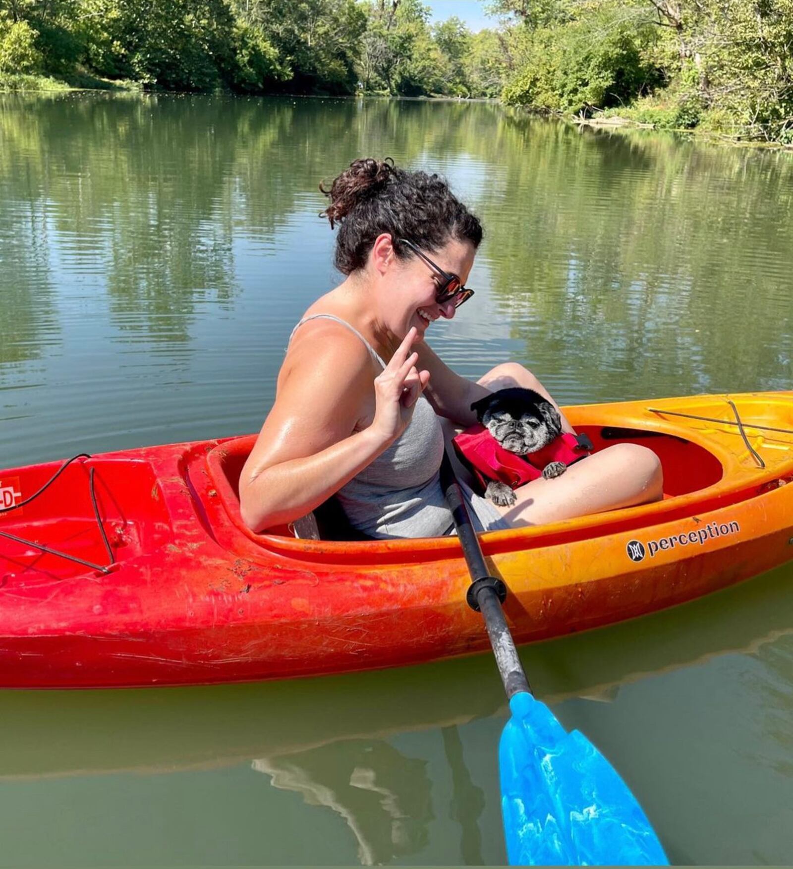 Jen Papadakis enjoys time in a canoe with her pug Frank. 