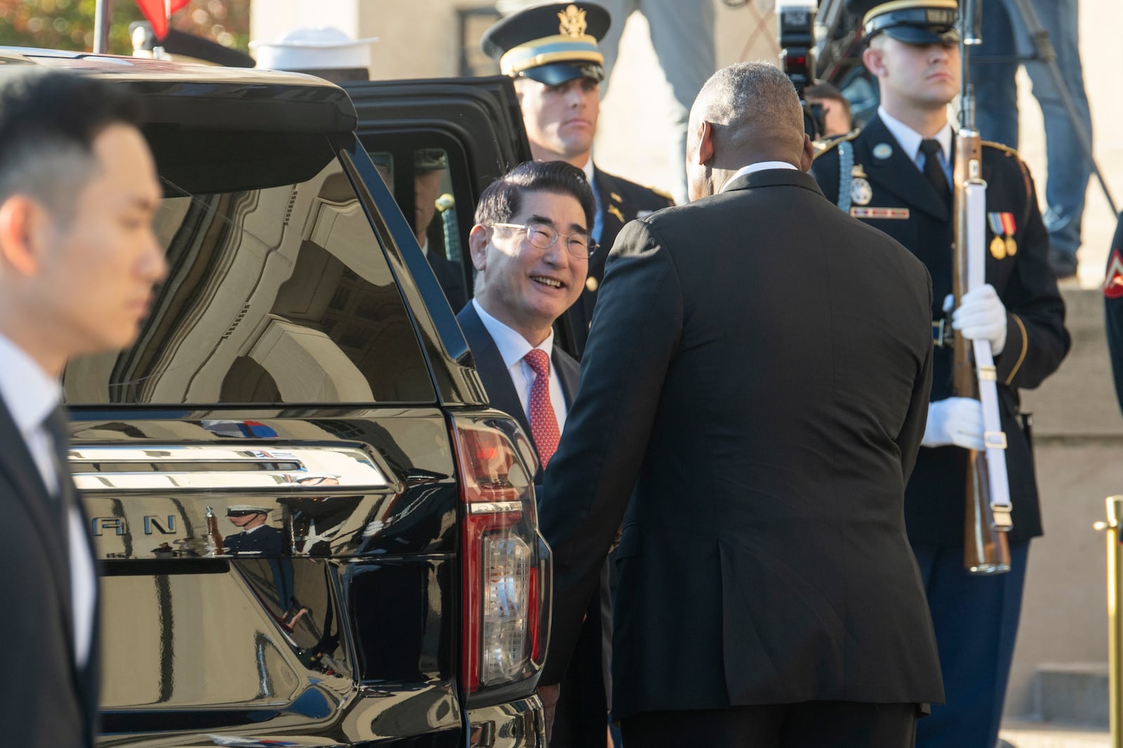 Defense Secretary Lloyd Austin welcomes South Korean Defense Minister Kim Yong Hyun, center, to the Pentagon on Wednesday, Oct. 30, 2024 in Washington. (AP Photo/Kevin Wolf)