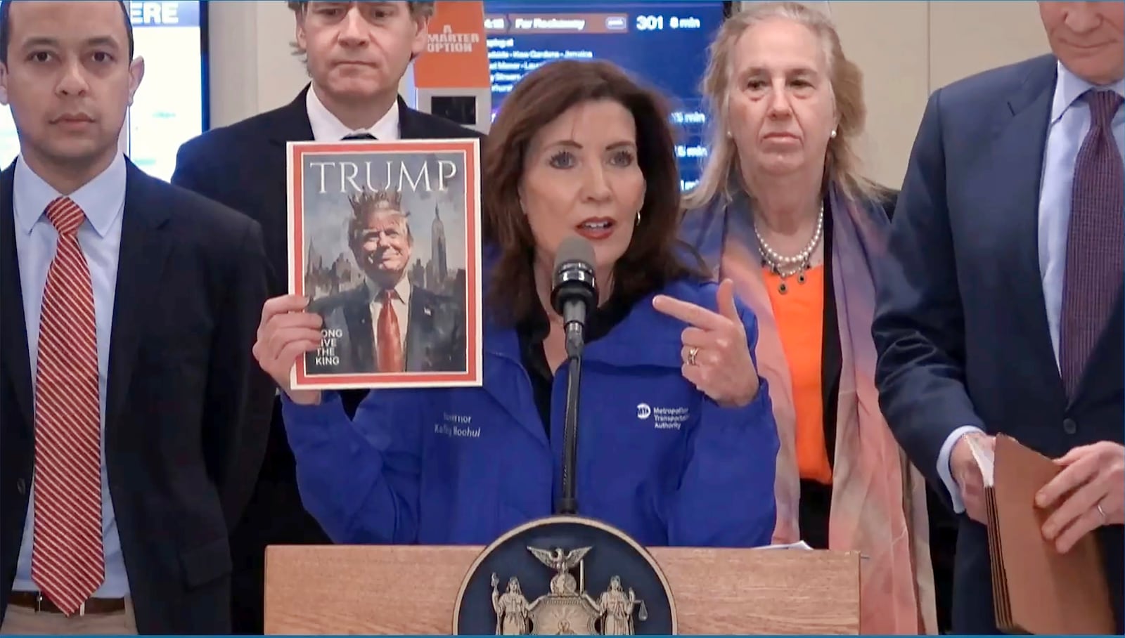 This image from video provided by Office of the New York Governor shows New York Gov. Kathy Hochul holding a mock magazine cover during an event about congestion pricing at New York's Grand Central Terminal, Wednesday, Feb. 19, 2025. (Office of the New York Governor via AP)