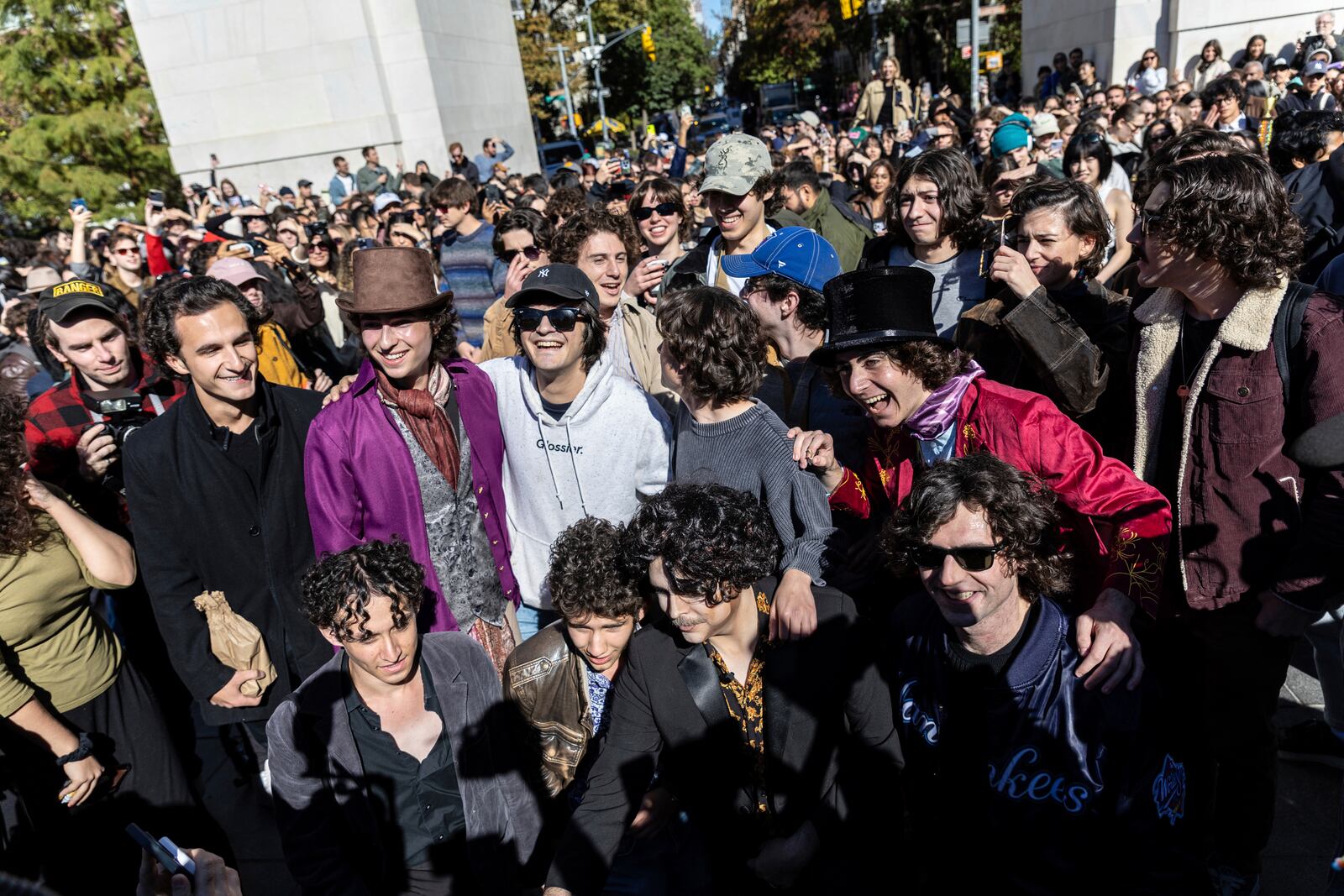 Contestants gather for the Timothee Chalamet lookalike contest in Washington Square Park, Sunday, Oct. 27, 2024, in New York. (AP Photo/Stefan Jeremiah)