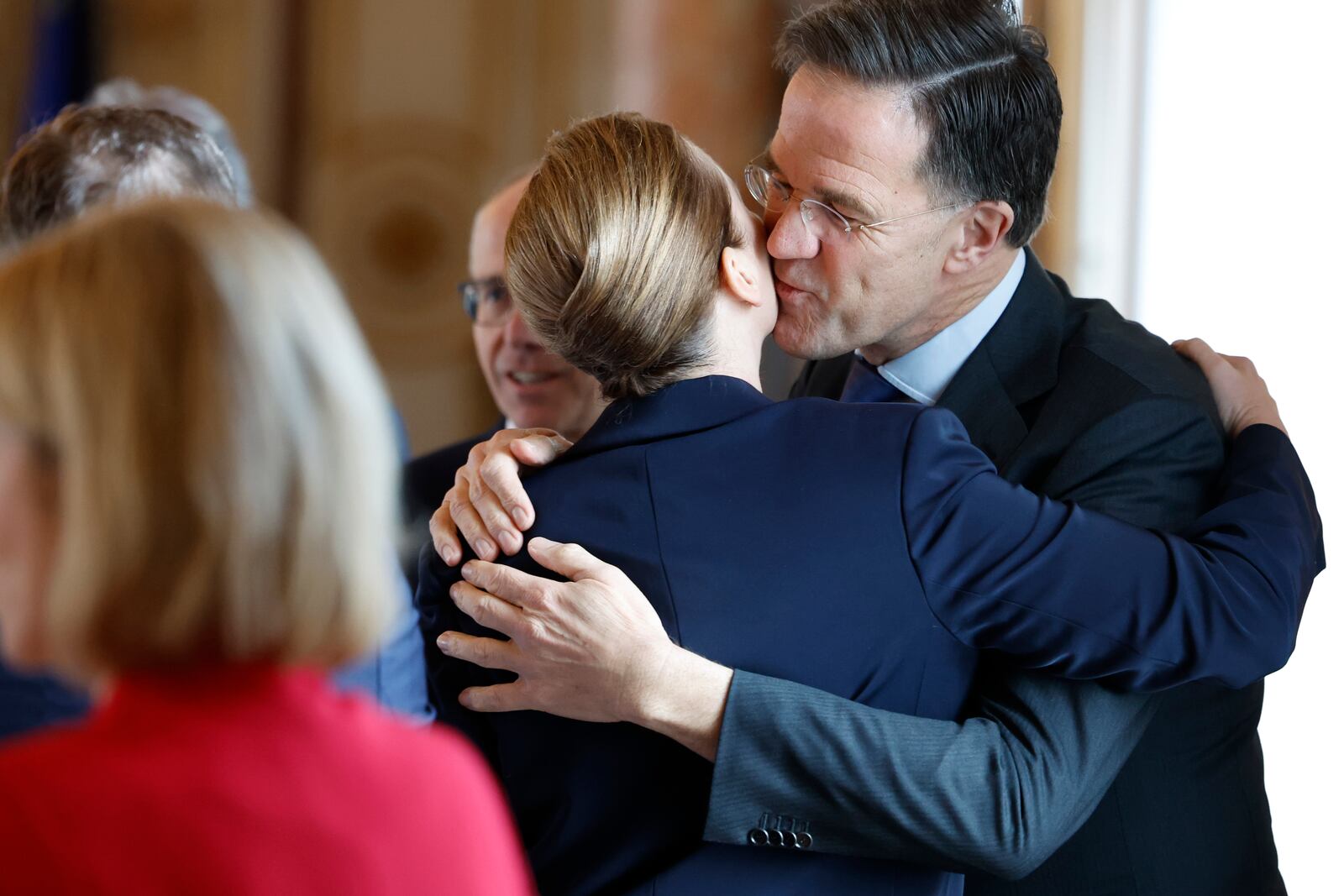 NATO Secretary General Mark Rutte, right, greets Denmark's Prime Minister Mette Frederiksen during an EU summit at the Egmont Palace in Brussels, Monday, Feb. 3, 2025. (AP Photo/Geert Vanden Wijngaert, Pool)