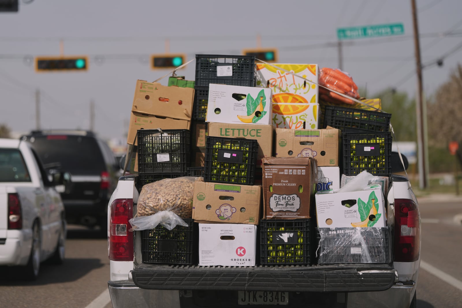 A truck loaded with produce passes through Pharr, Texas, Tuesday, March 4, 2025. (AP Photo/Eric Gay)