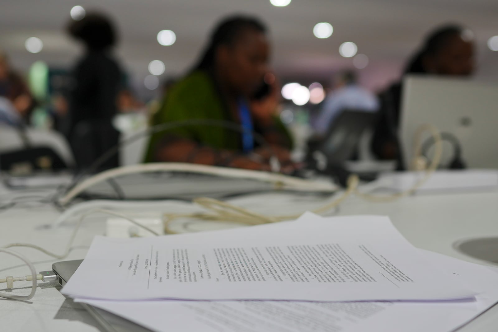 A draft of a proposed deal for curbing climate change sits on a table at the COP29 U.N. Climate Summit, Friday, Nov. 22, 2024, in Baku, Azerbaijan. (AP Photo/Peter Dejong)