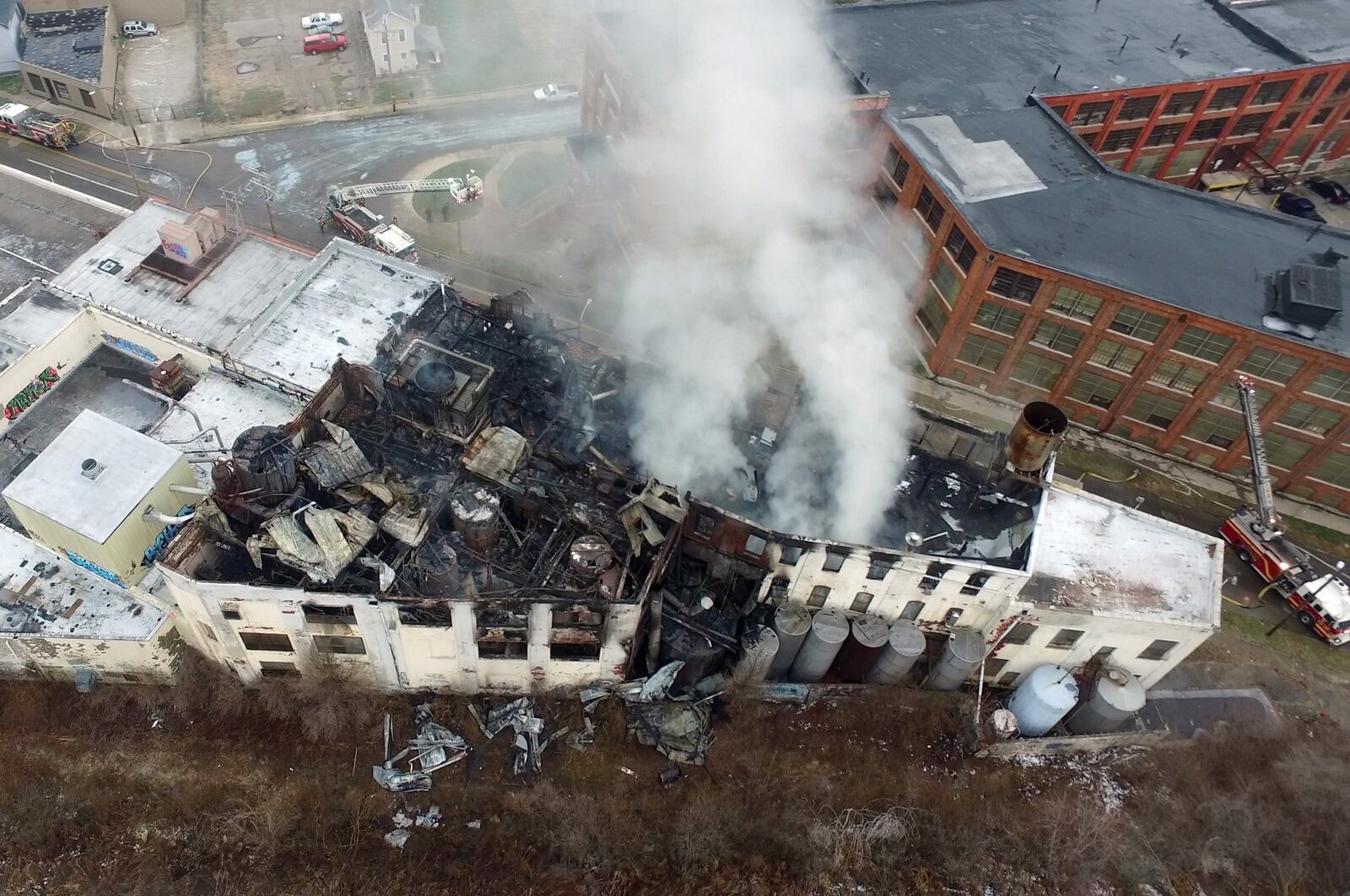 The former Hewitt Soap Factory burned overnight on Thursday. The factory is located on Linden Ave. in east Dayton. TY GREENLEES / STAFF