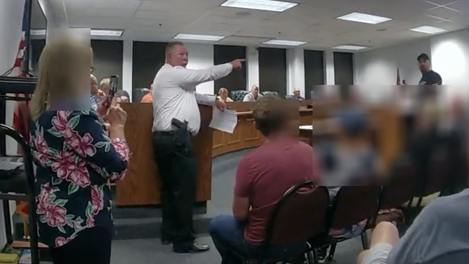 Wilmington Police Chief Ronald Fithen yells "jail" for Darrell Petrey for allegedly 'disrupting' a city council meeting in April. The charge was dismissed. CREDIT: Wilmington Police Department BWC video screenshot