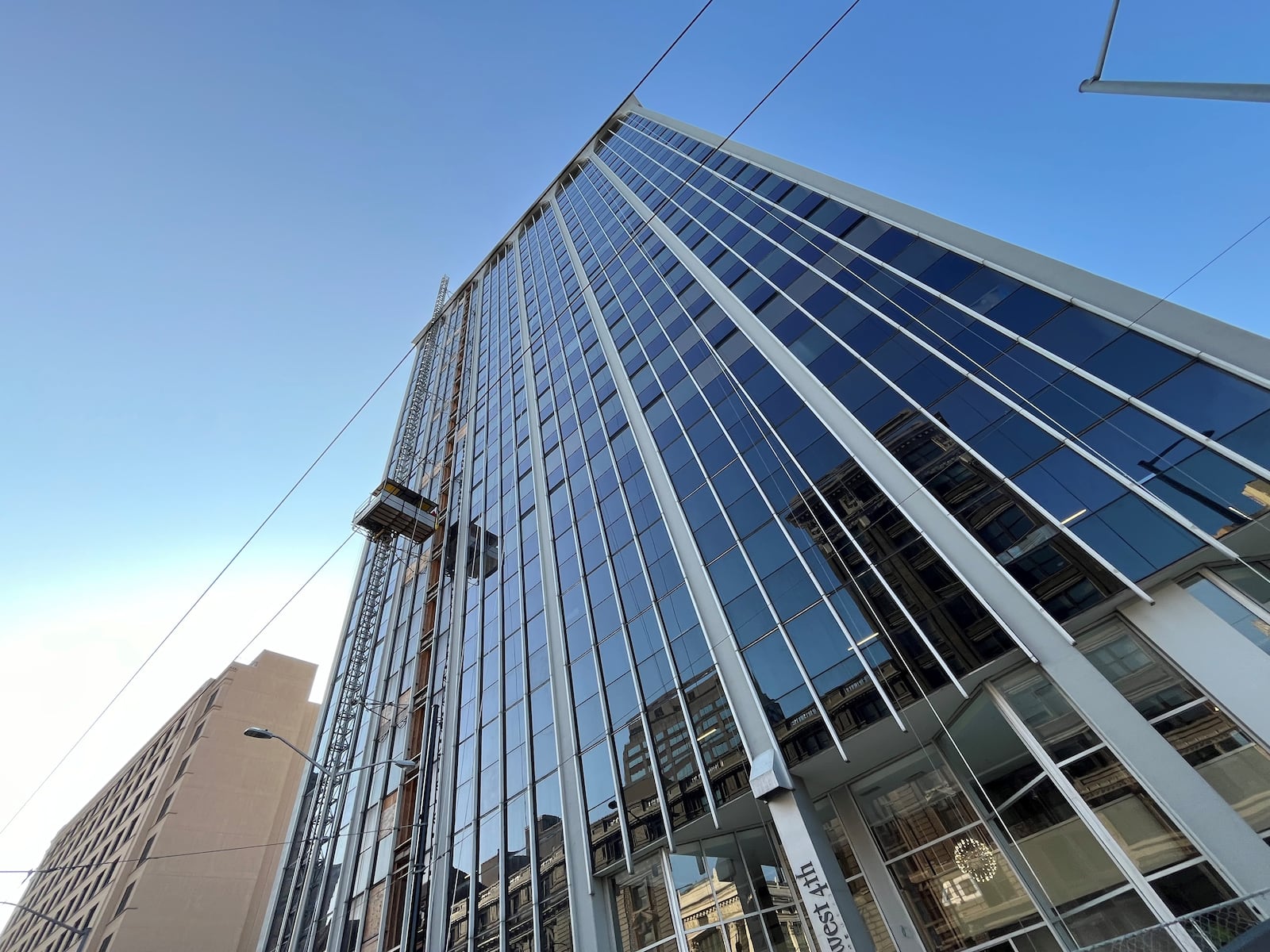 Developer Windsor Companies is renovating the vacant Grant-Deneau Tower in downtown Dayton. The 22-story tower will have about 149 housing units. CORNELIUS FROLIK / STAFF