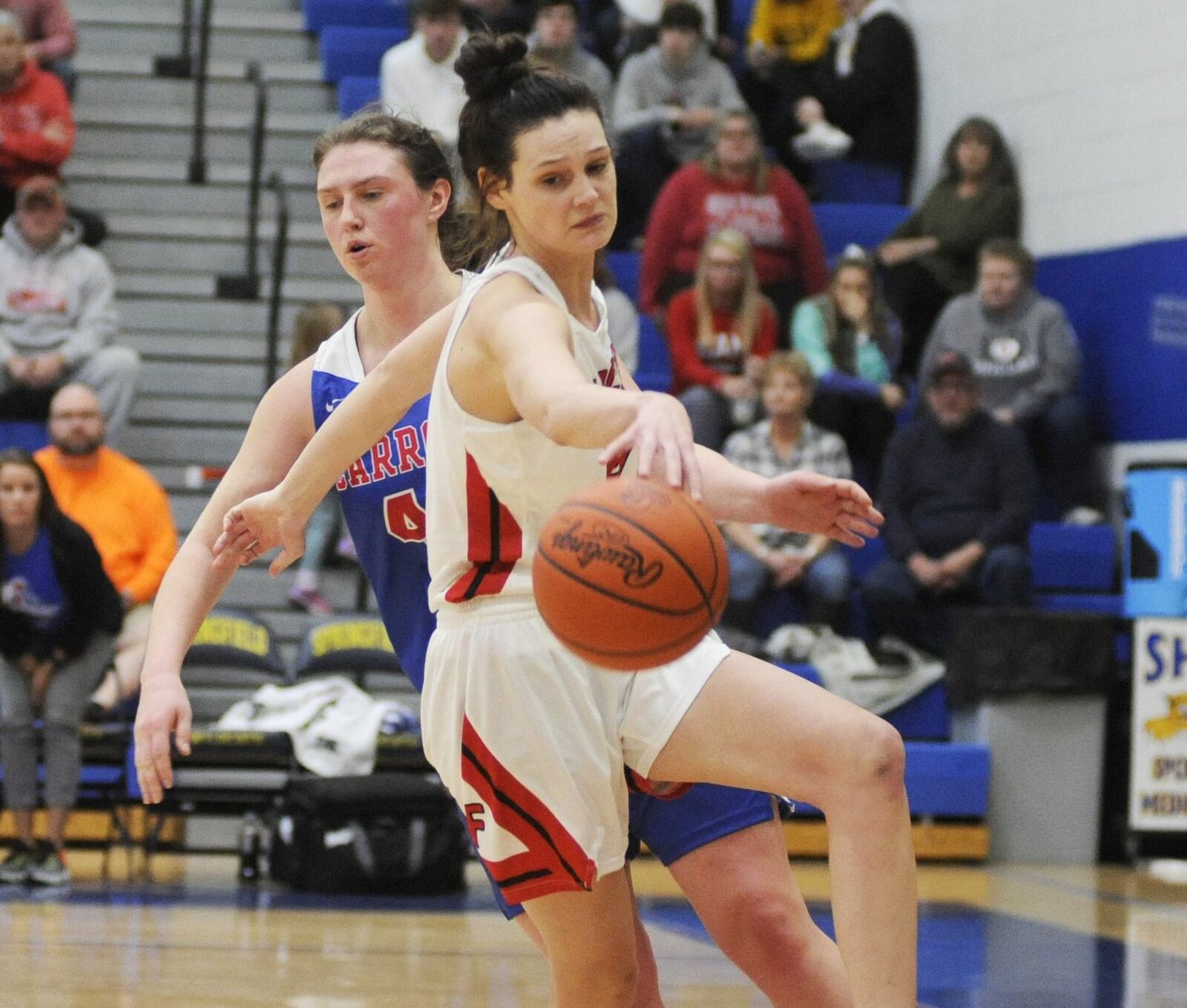 Layne Ferrell of Franklin beats Julia Keller of Carroll to a rebound. Carroll defeated Franklin 57-43 in a girls high school basketball D-II regional final at Springfield High School on Friday, March 8, 2019. MARC PENDLETON / STAFF