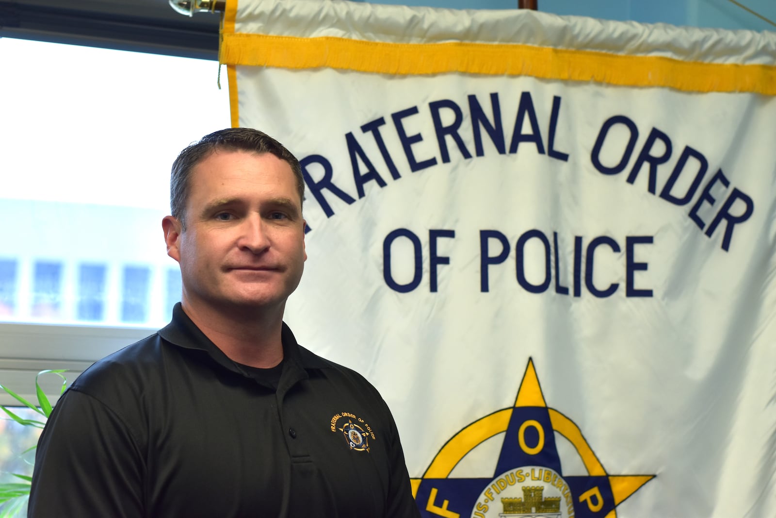 Dayton police Sgt. Kyle Thomas, president of the Dayton Fraternal Order of Police Lodge No. 44. CORNELIUS FROLIK / STAFF