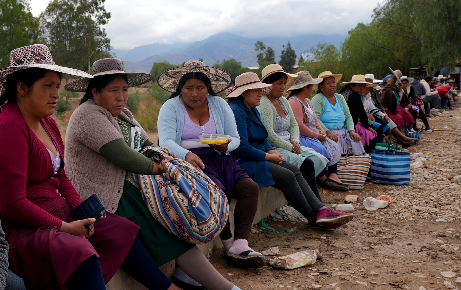 Supporters of former Bolivian President Evo Morales block a road as pressure to prevent the former leader from facing a criminal investigation over allegations of abuse of a minor, near Cochabamba, Bolivia, Saturday, Oct. 26, 2024. (AP Photo/Juan Karita)