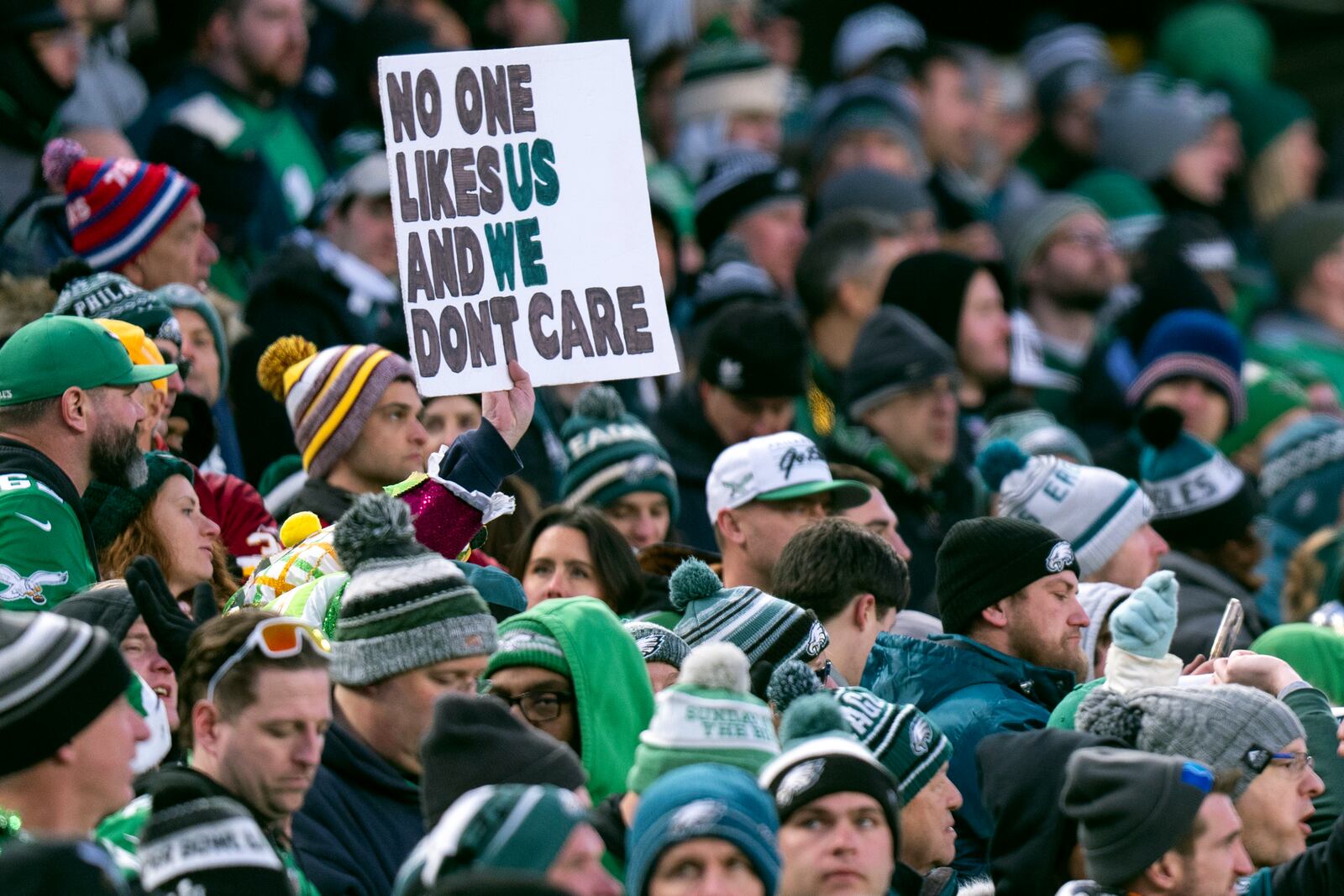 FILE - Philadelphia Eagles fans hold up a sign during the NFC Championship NFL football game against the Washington Commanders, Sunday, Jan. 26, 2025, in Philadelphia. (AP Photo/Chris Szagola, File)