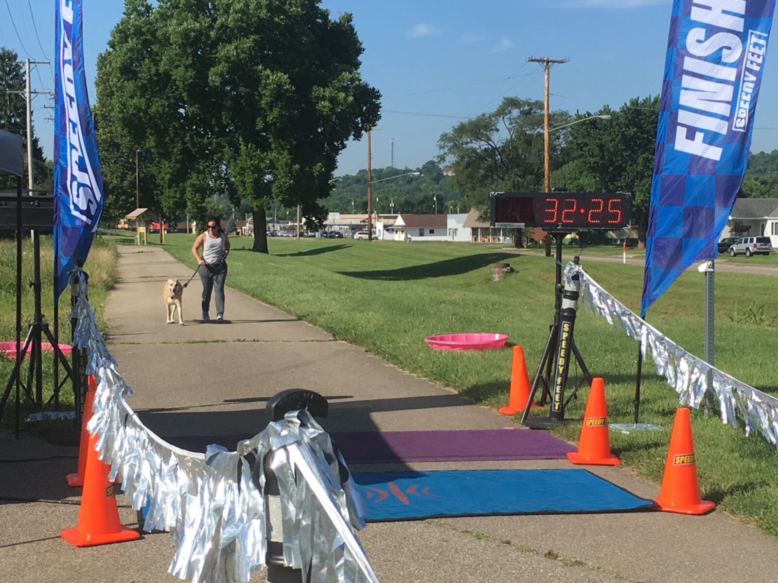 A dog and their pet parent work together to cross the finish line. PHOTO/Jeffrey Brown