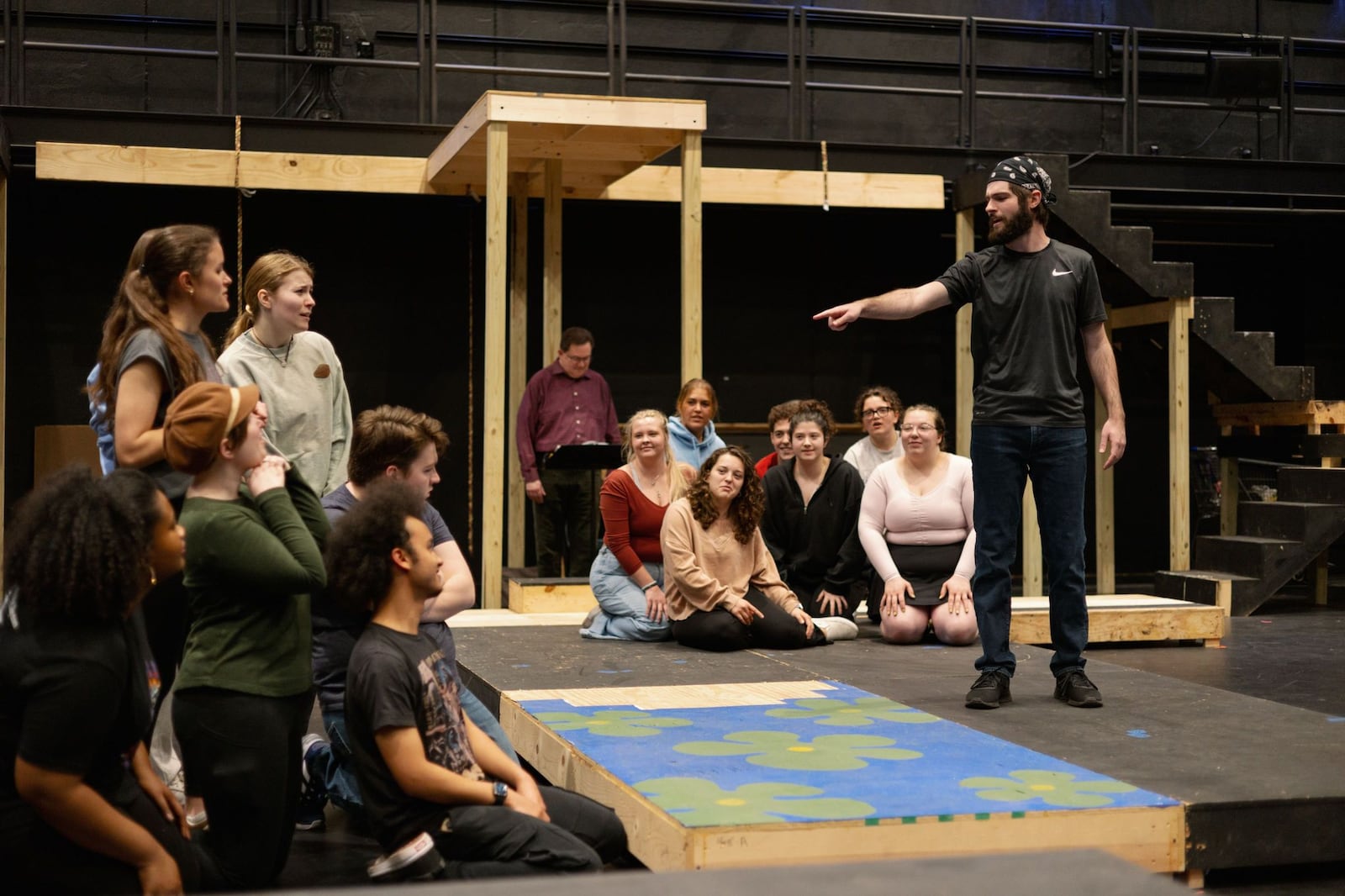 Luke DeVilliers (Jesus) with ensemble of University of Dayton's production of "Godspell." PHOTO BY SYLVIA STAHL