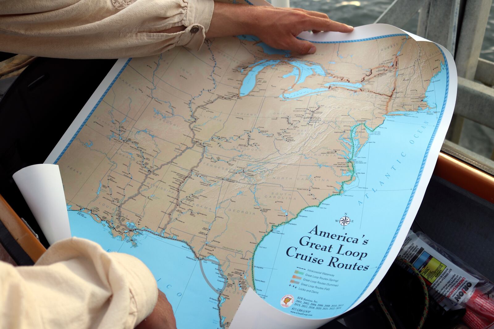 Peter Frank holds a map Thursday, Nov. 7, 2024, of the Great Loop, a 6,000-mile journey he is trying to complete in a canoe, during a stop in Annapolis, Md. (AP Photo/Brian Witte)