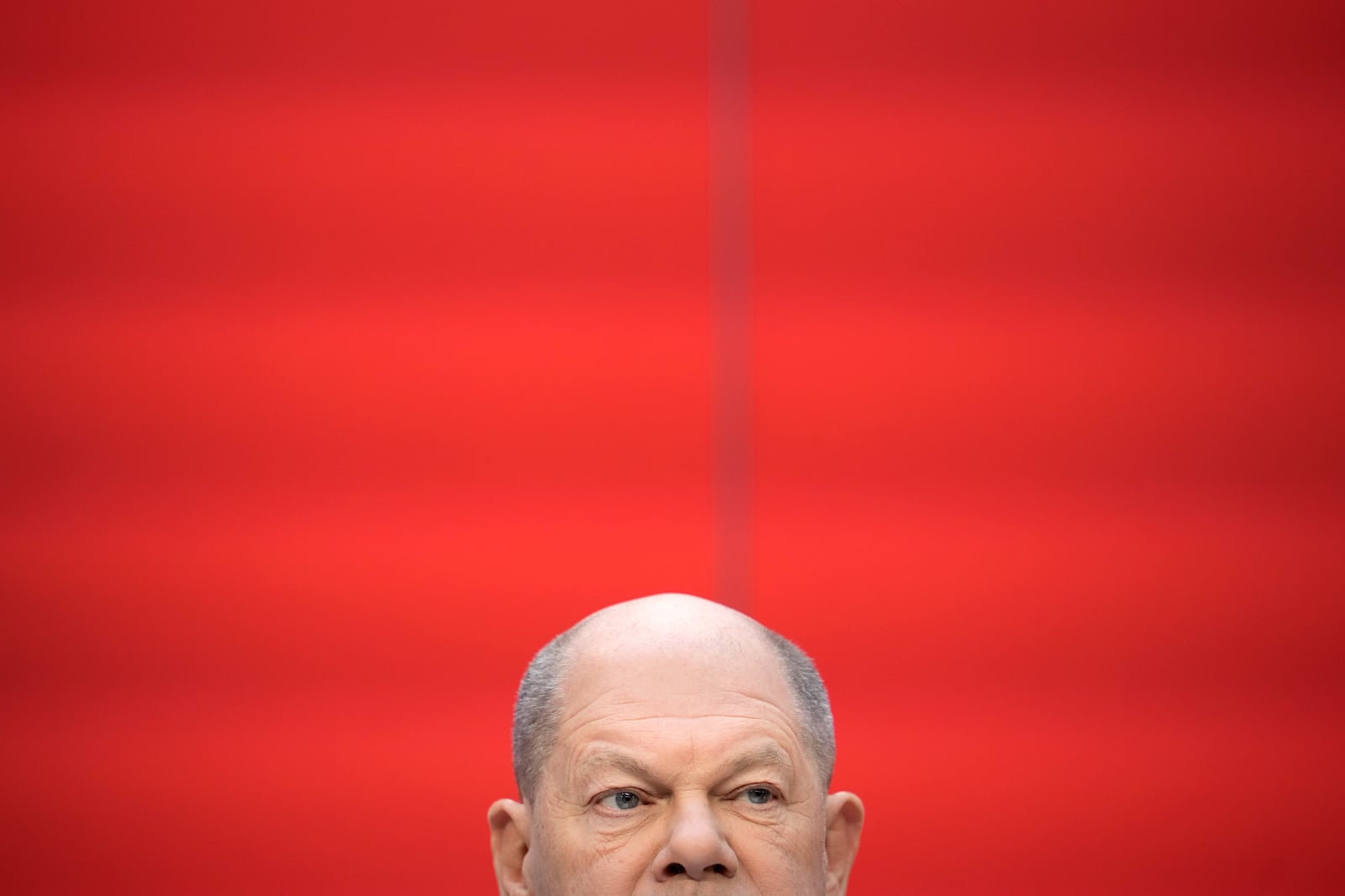 German Chancellor Olaf Scholz attends a press conference of the Social Democratic Party (SPD) in Berlin, Germany, Monday, Feb. 24, 2025, the day after the national election. (AP Photo/Ebrahim Noroozi)