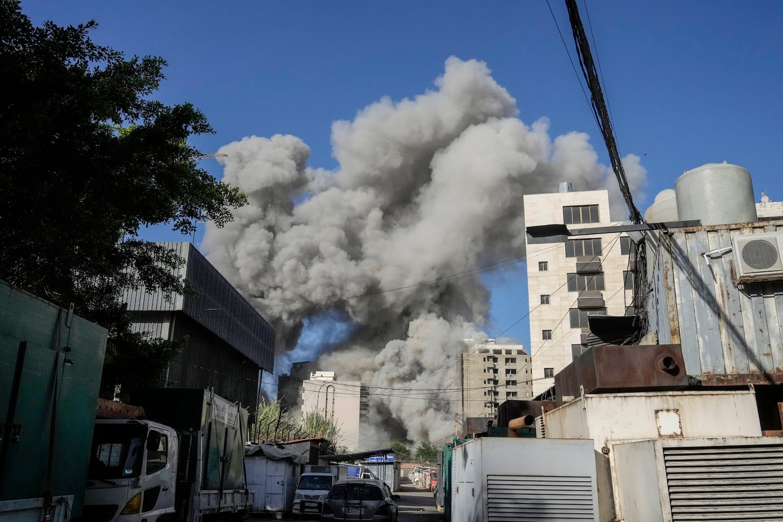 Smoke rises from a building that collapsed following an Israeli airstrike in Chiyah, south of Beirut, Lebanon, Sunday, Nov. 17, 2024. (AP Photo/Bilal Hussein)