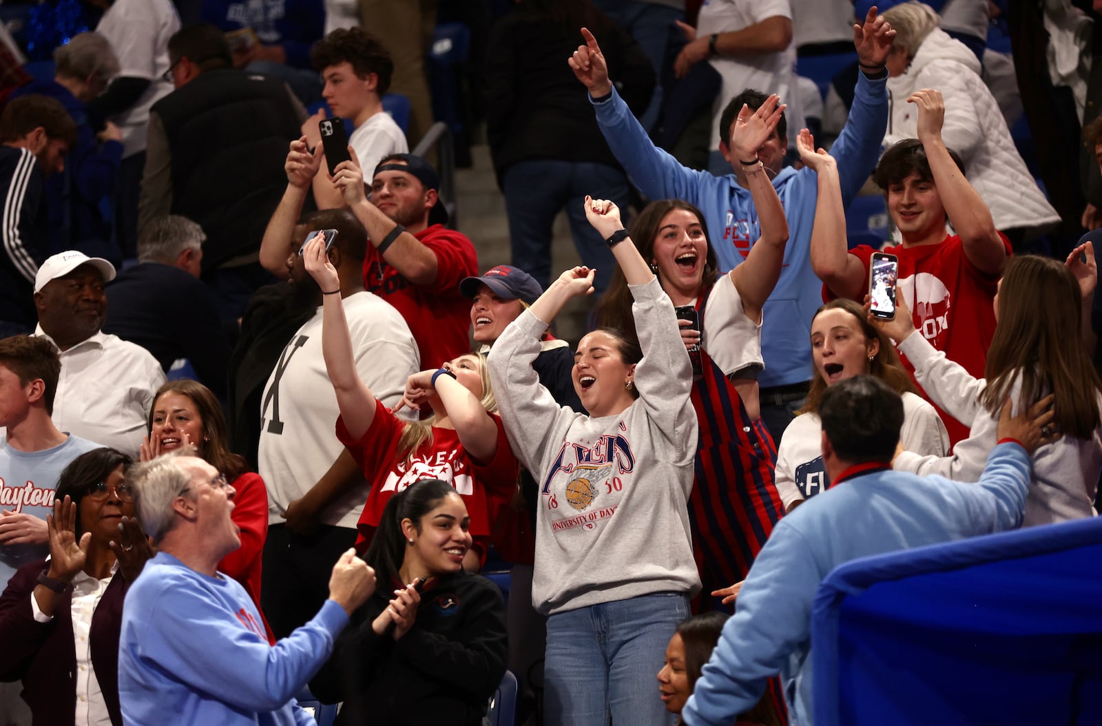 Dayton fans cheer after a victory against Saint Louis on Friday, Jan. 31, 2025, at Chaifetz Arena in St. Louis, Mo.. David Jablonski/Staff