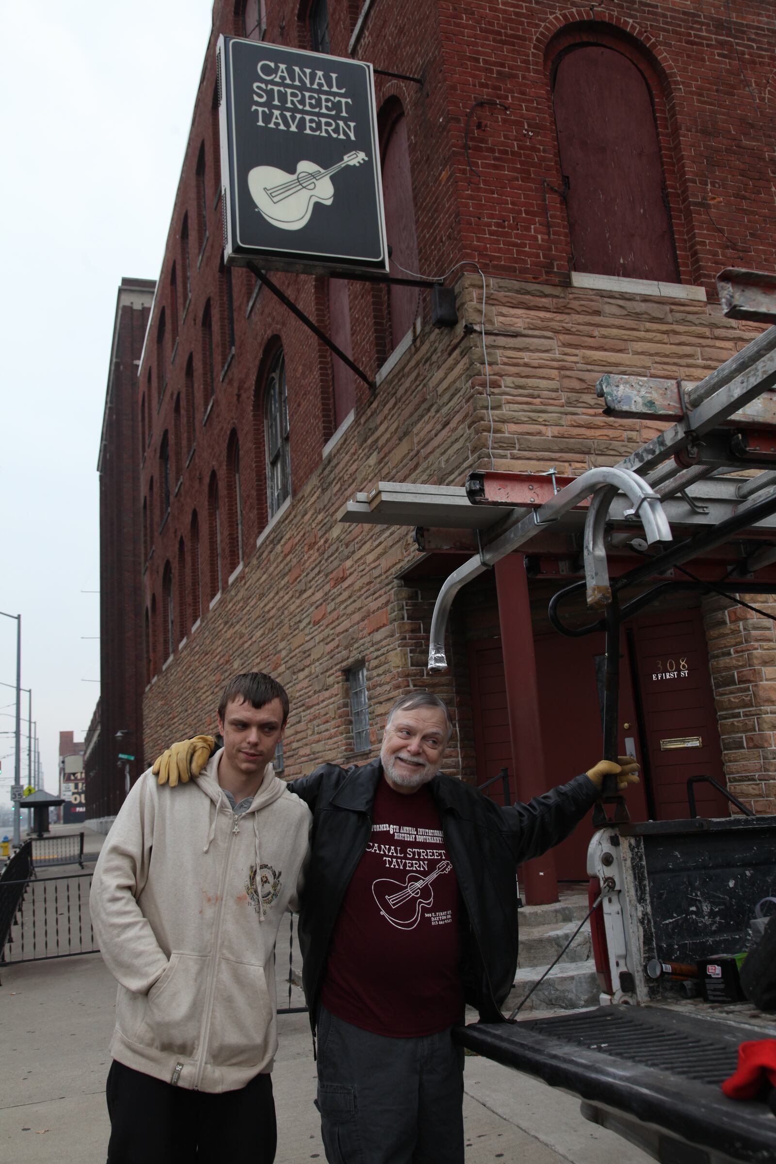 Mick Montgomery and his son Eli outside of Canal Street in 2013.