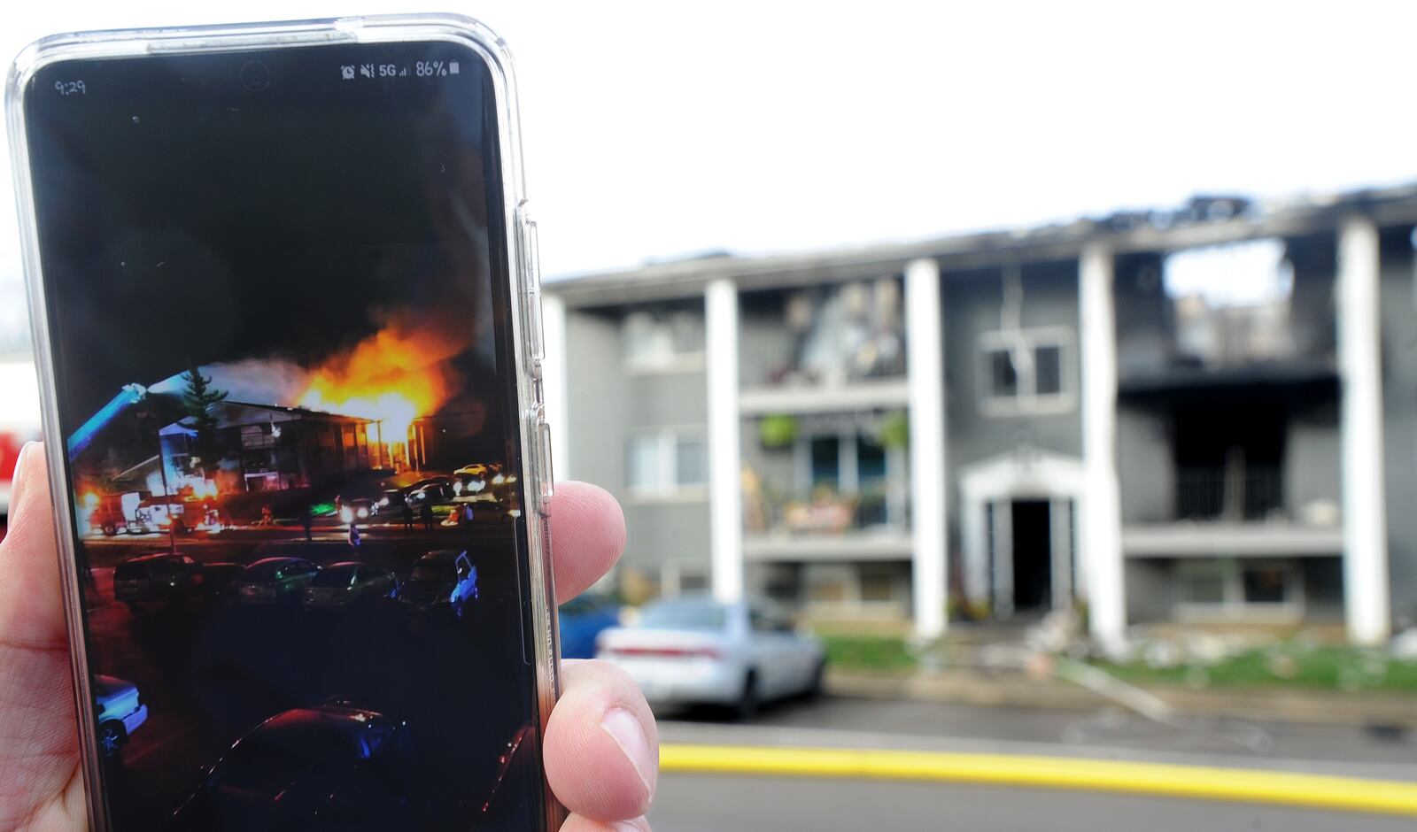 A Kettering apartment complex was severely damaged by fire. Here, a witness shows a video on a cell phone.