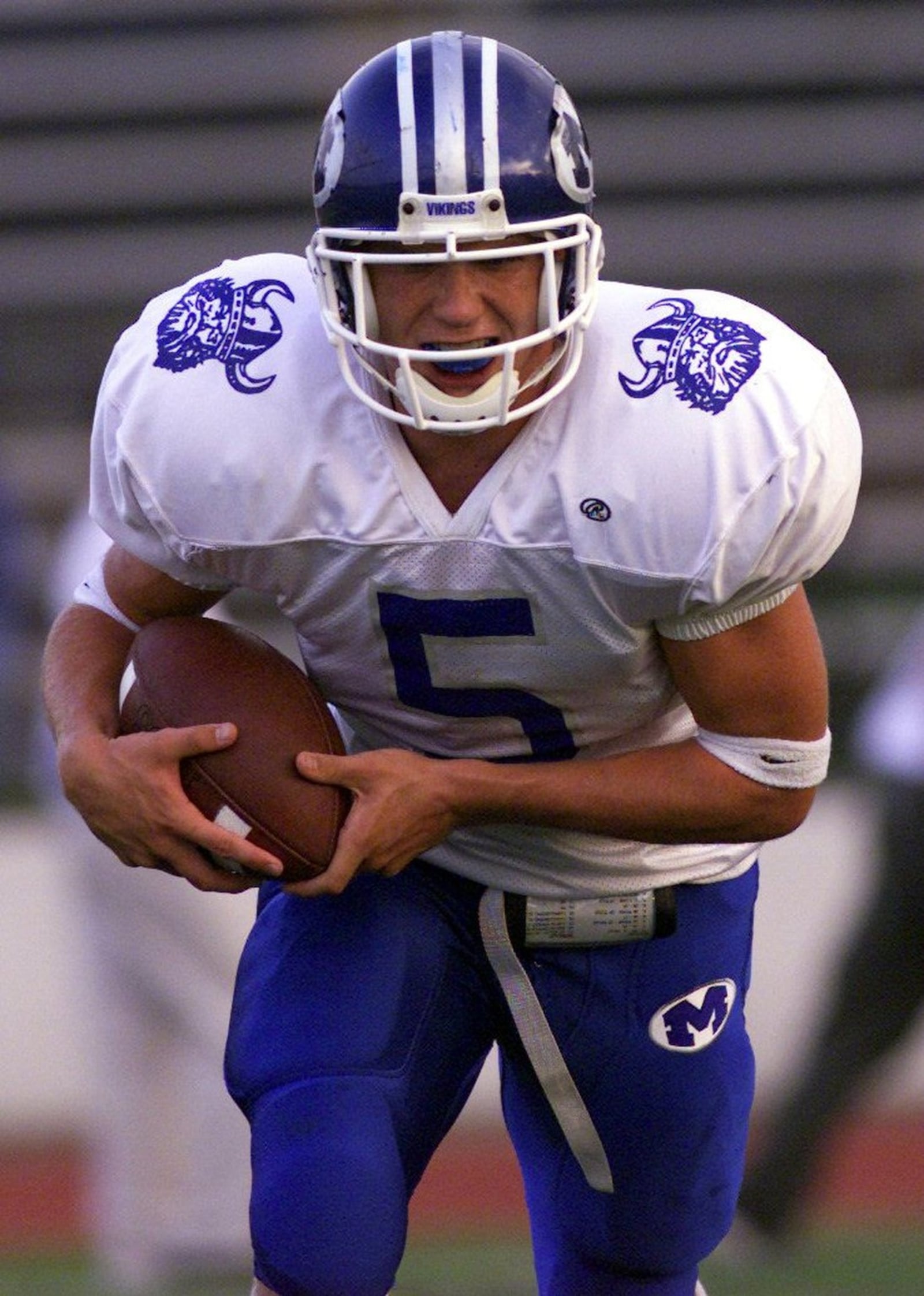 0908Wayne-p6 Miamisburg’s Matt Muncy warms up with his team before their game against the Wayne Warriors at Wayne High School, Friday.