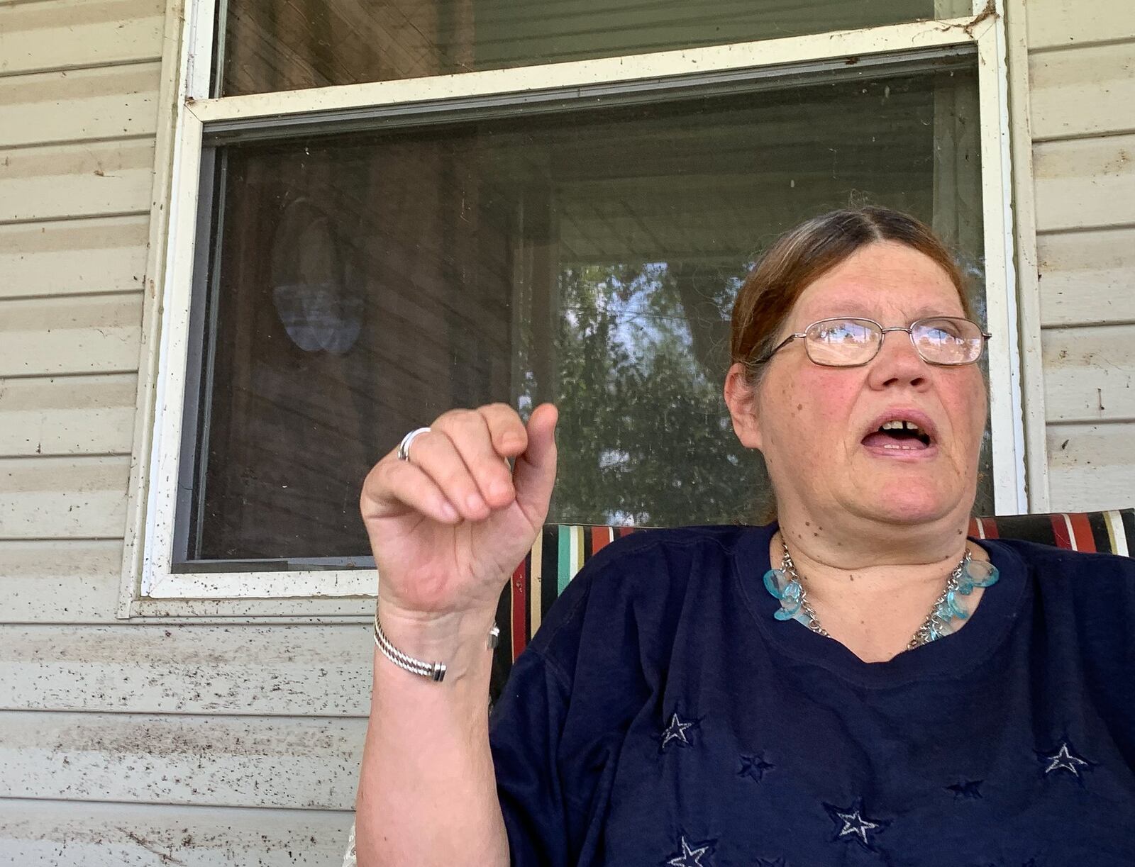 As a tornado approached, Robin Cave of Perry Twp. climbed into a bath tub and pleaded with her husband Darell to join her. He stayed in the living room watching TV. CHRIS STEWART / STAFF