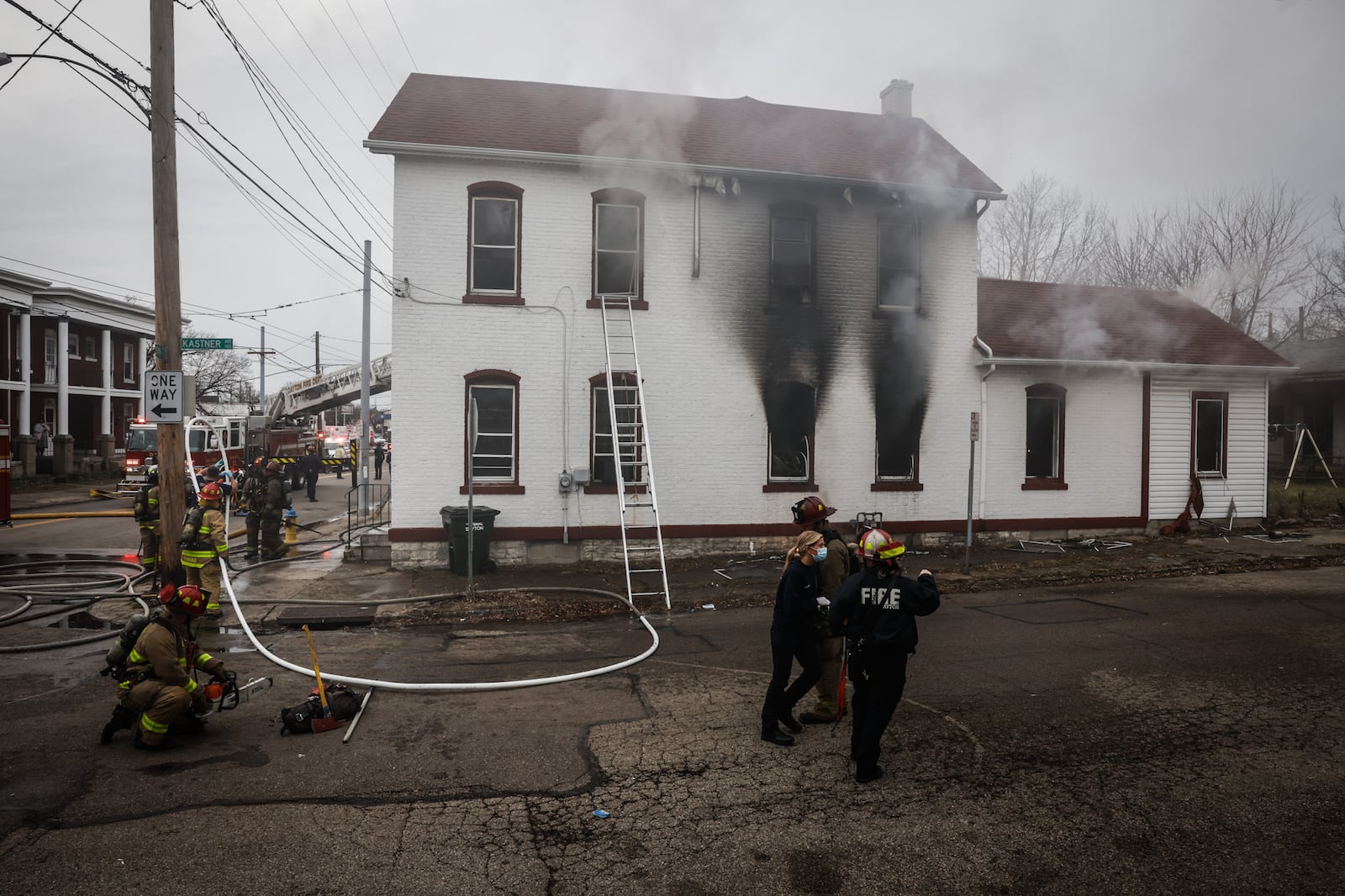 At least one person was injured Wednesday afternoon, Jan. 19, 2022, in a house fire in the 100 block of Xenia Avenue in Dayton. JIM NOELKER/STAFF