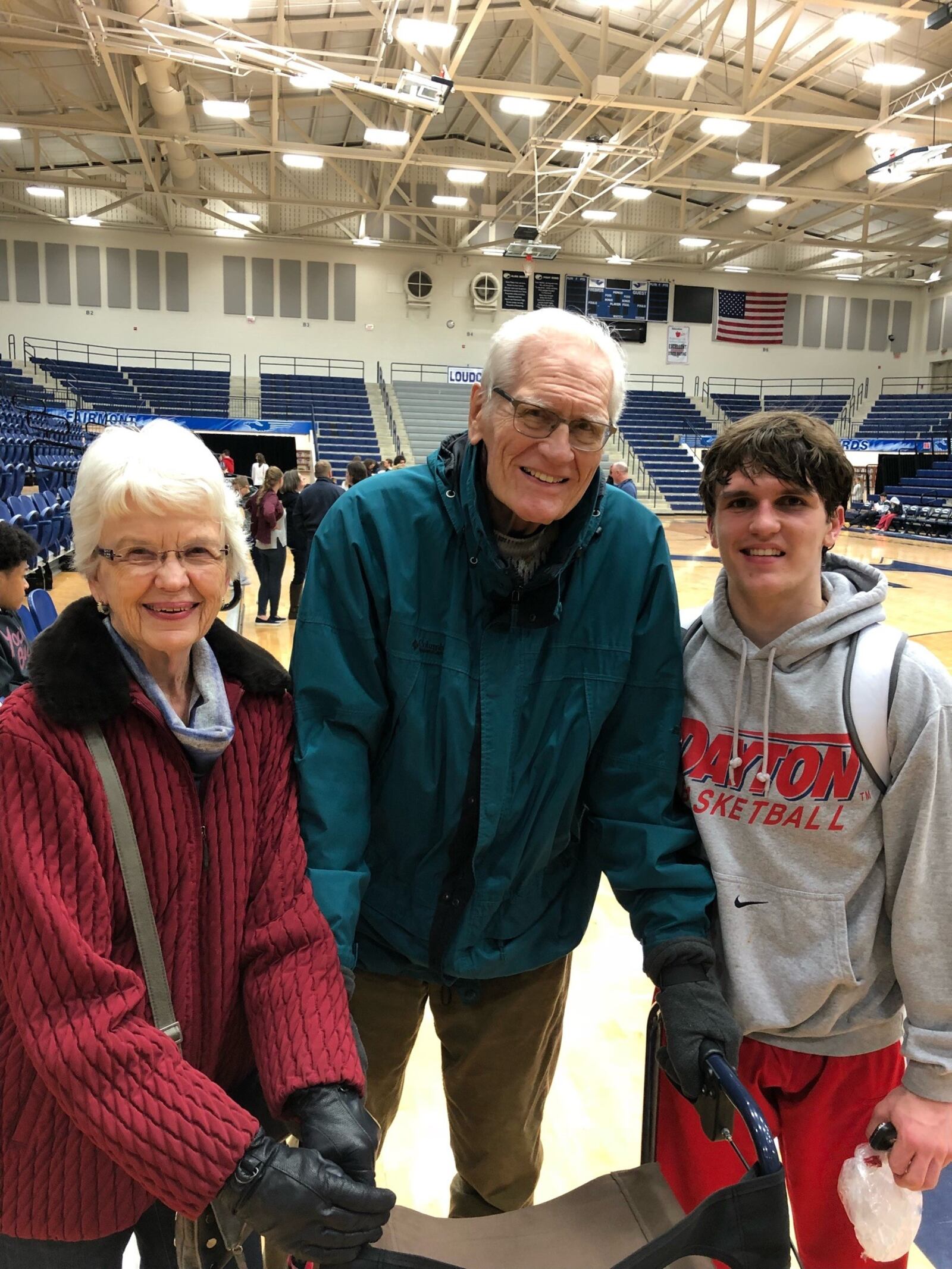 Dayton basketball player Brady Uhl with is grandparents Bill and Cynthia Uhl. The couple was married 65 years. CONTRIBUTED