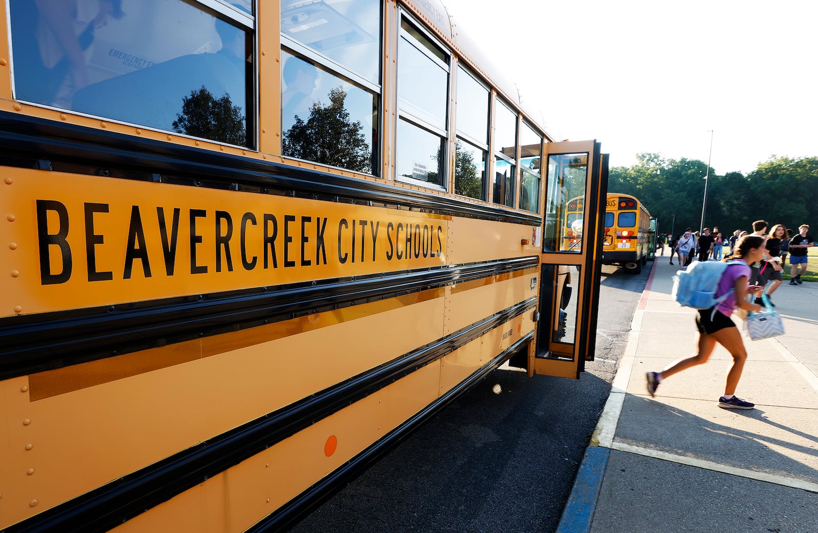 Students arrive Wednesday, Aug. 14, 2024 for the first day of school at Beavercreek High School. MARSHALL GORBY\STAFF