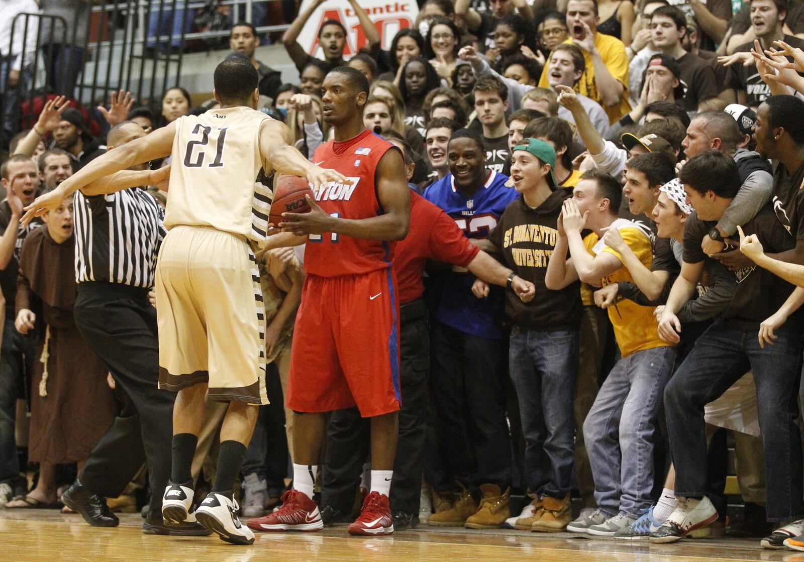 Dayton forward Dyshawn Pierre in-bounds the ball in front of the Saint Bonaventure student section in the final minute on Saturday, Feb. 8, 2014, at the Reilly Center in Olean, N.Y. David Jablonski/Staff