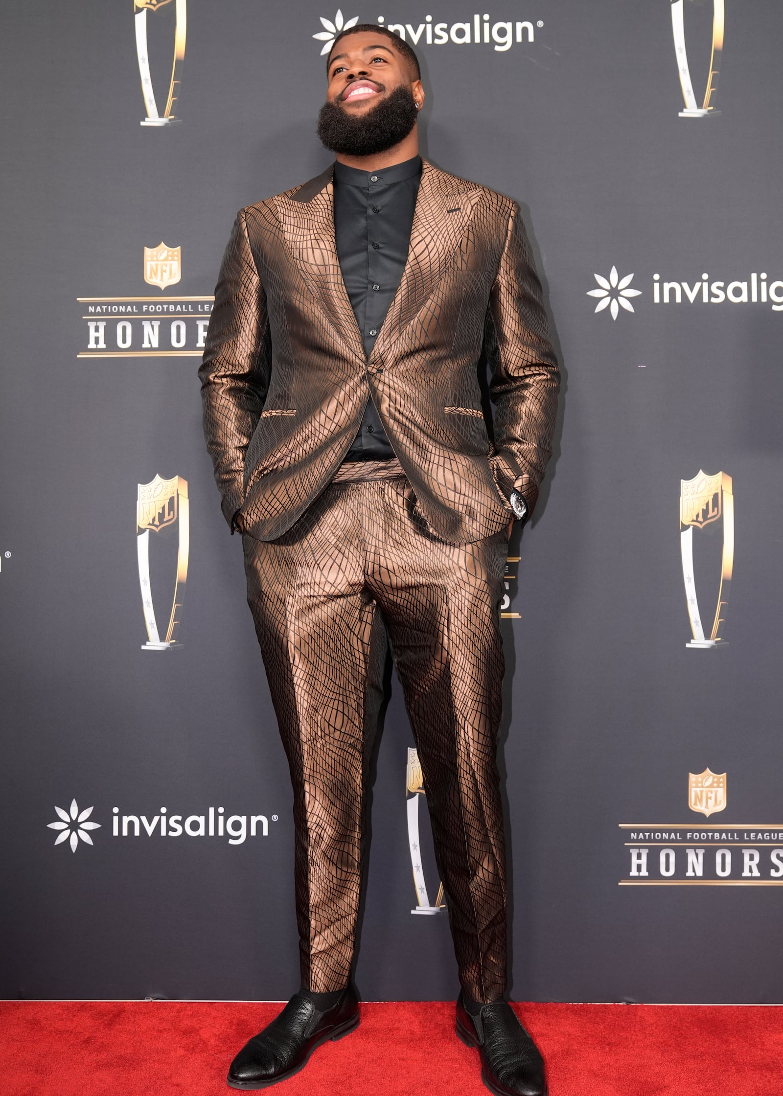 Jared Verse, of the Los Angels Rams, poses on the red carpet at the NFL Honors award show ahead of the Super Bowl 59 football game, Thursday, Feb. 6, 2025, in New Orleans. (AP Photo/Gerald Herbert)