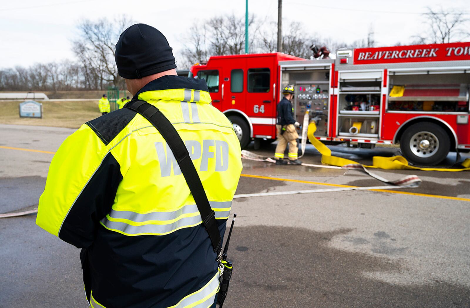 Bryan Weeks, 788th Civil Engineer Squadron assistant fire chief for training, takes notes as he watches a Beavercreek Township Fire Department engine company take part in a training exercise on March 3 at the Dayton Fire Training Center. Weeks, and other Wright-Patterson Fire Department leadership took part in the exercise to help evaluate the Beavercreek department’s command structure. U.S. AIR FORCE PHOTO/R.J. ORIEZ