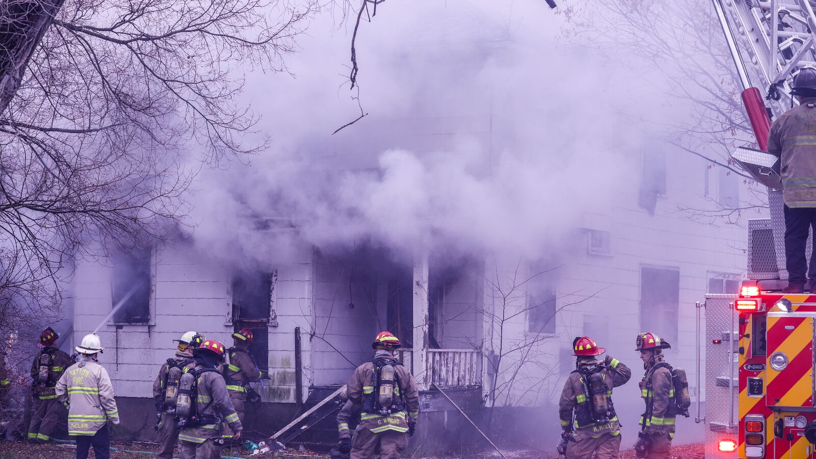 Crews worked to extinguish a fire at a vacant house at the corner of Marathon and Wheatley avenues in Dayton on Friday, Dec.10, 2021. JIM NOELKER / STAFF