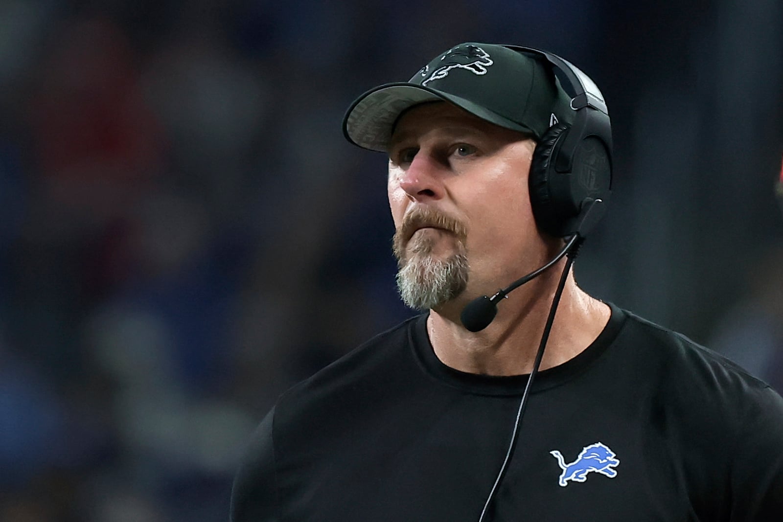 Detroit Lions head coach Dan Campbell watches against the Washington Commanders during the first half of an NFL football divisional playoff game, Saturday, Jan. 18, 2025, in Detroit. (AP Photo/Rey Del Rio)