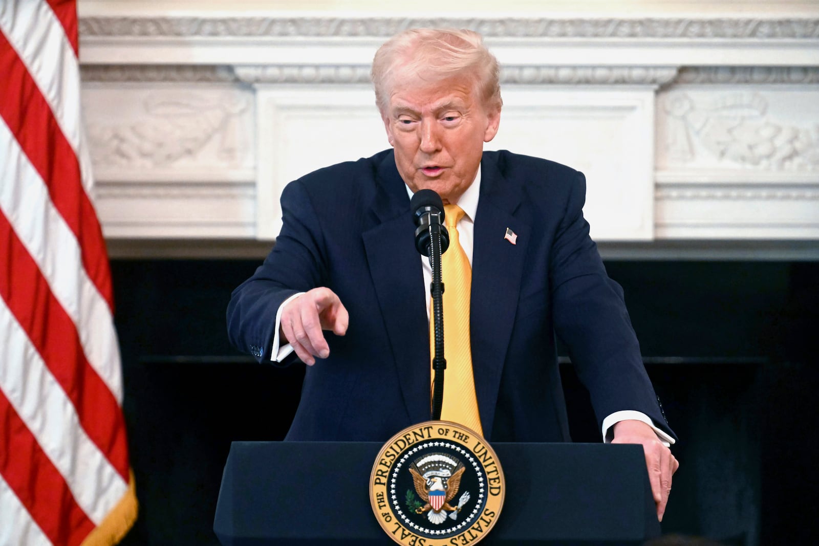 President Donald Trump speaks at the Governors Working Session in the State Dining Room of the White House in Washington, Friday, Feb. 21, 2025. (Pool via AP)