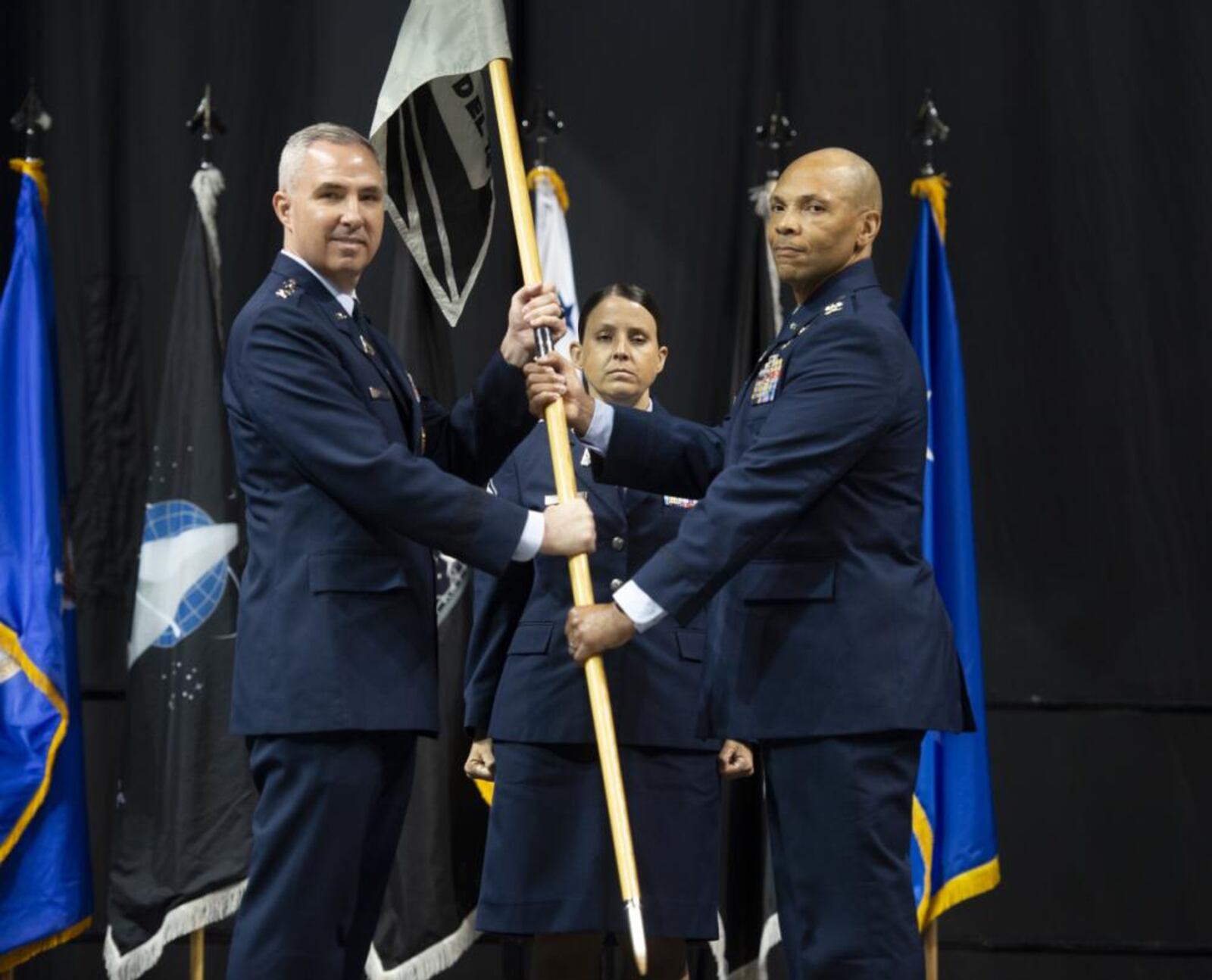 U.S. Space Force Col. Marqus Randall, Space Delta 18 commander, takes Space Delta 18's guidon for the first time at the activation ceremony for Space Operations Command's newest Delta, Space Delta 18, and established the National Space Intelligence Center (NSIC) at the Nutter Center in June 2022. Space Delta 18 is named in honor of the U.S. Space Force's role as the 18th member of the intelligence community. (U.S. Space Force photo by SrA Jack Gardner)