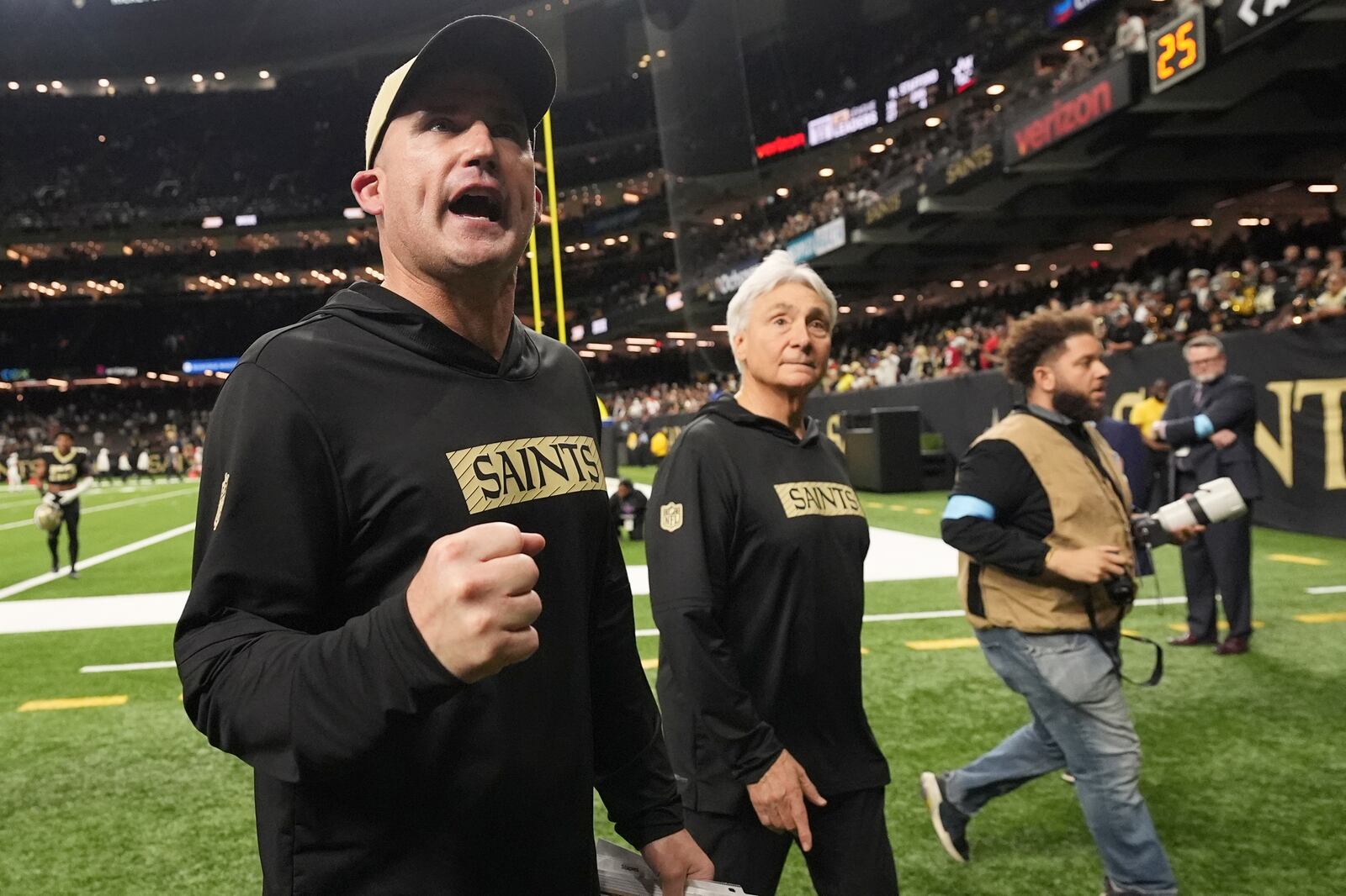 New Orleans Saints interim head coach Darren Rizzi gestures as he walks off the field after an NFL football game against the Cleveland Browns in New Orleans, Sunday, Nov. 17, 2024. (AP Photo/Gerald Herbert)