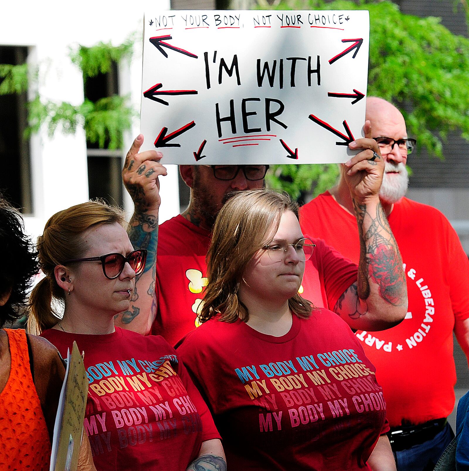 Approximately 100 people turned out Monday, June 24, 2024 at the Federal Building in Dayton to protest anti-abortion efforts across the country and the Supreme Court's Dobbs decision from two years ago. MARSHALL GORBY\STAFF