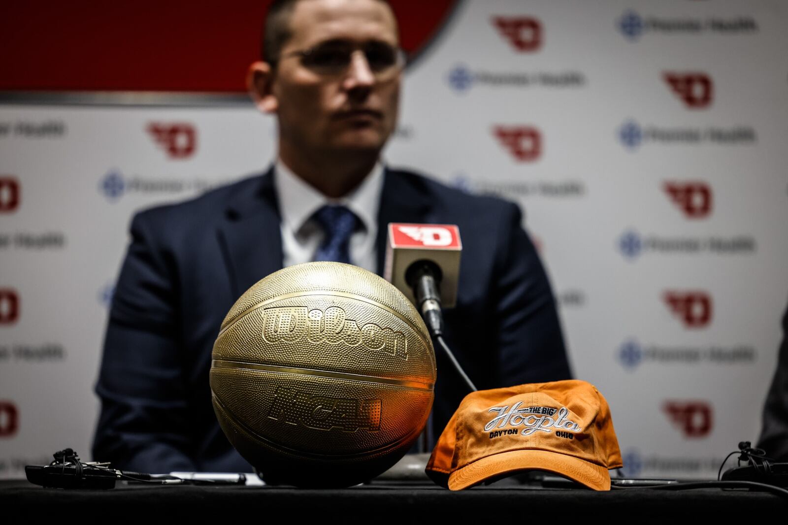 The golden basketball was on display at a press conference Monday March 7, 2022 to promote the NCAA First Four tournament coming to UD Arena March 15-16, JIM NOELKER/STAFF