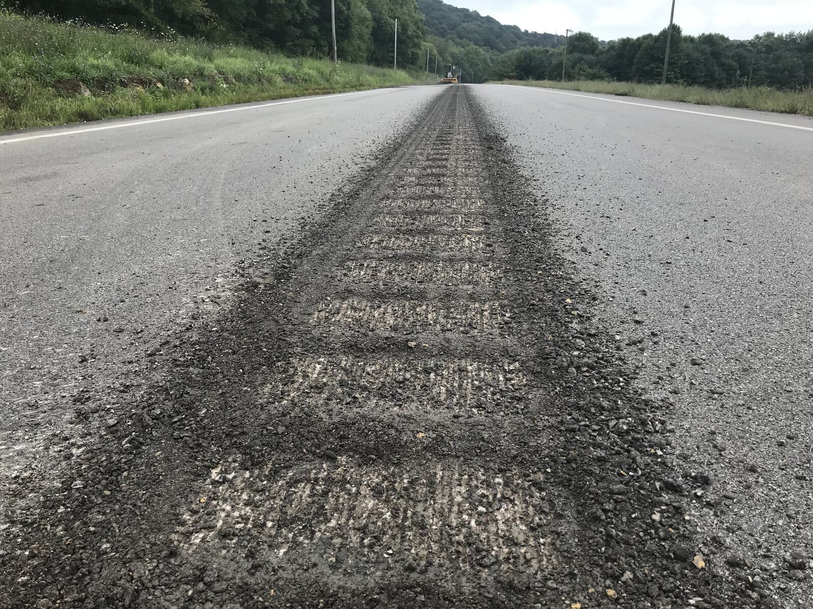 Ohio department of Transportation installs rumble strips to keep drivers from weaving into other lanes.