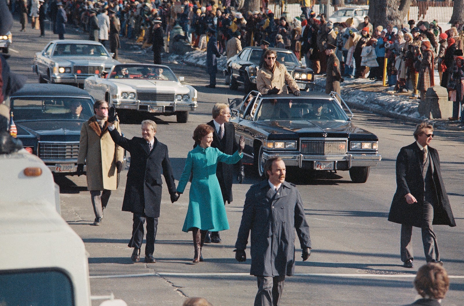 FILE - President Jimmy Carter and first lady Rosalynn Carter walk down Pennsylvania Avenue after Carter was sworn in as the nation's 39th president, Jan. 20, 1977, in Washington. (AP Photo, File)