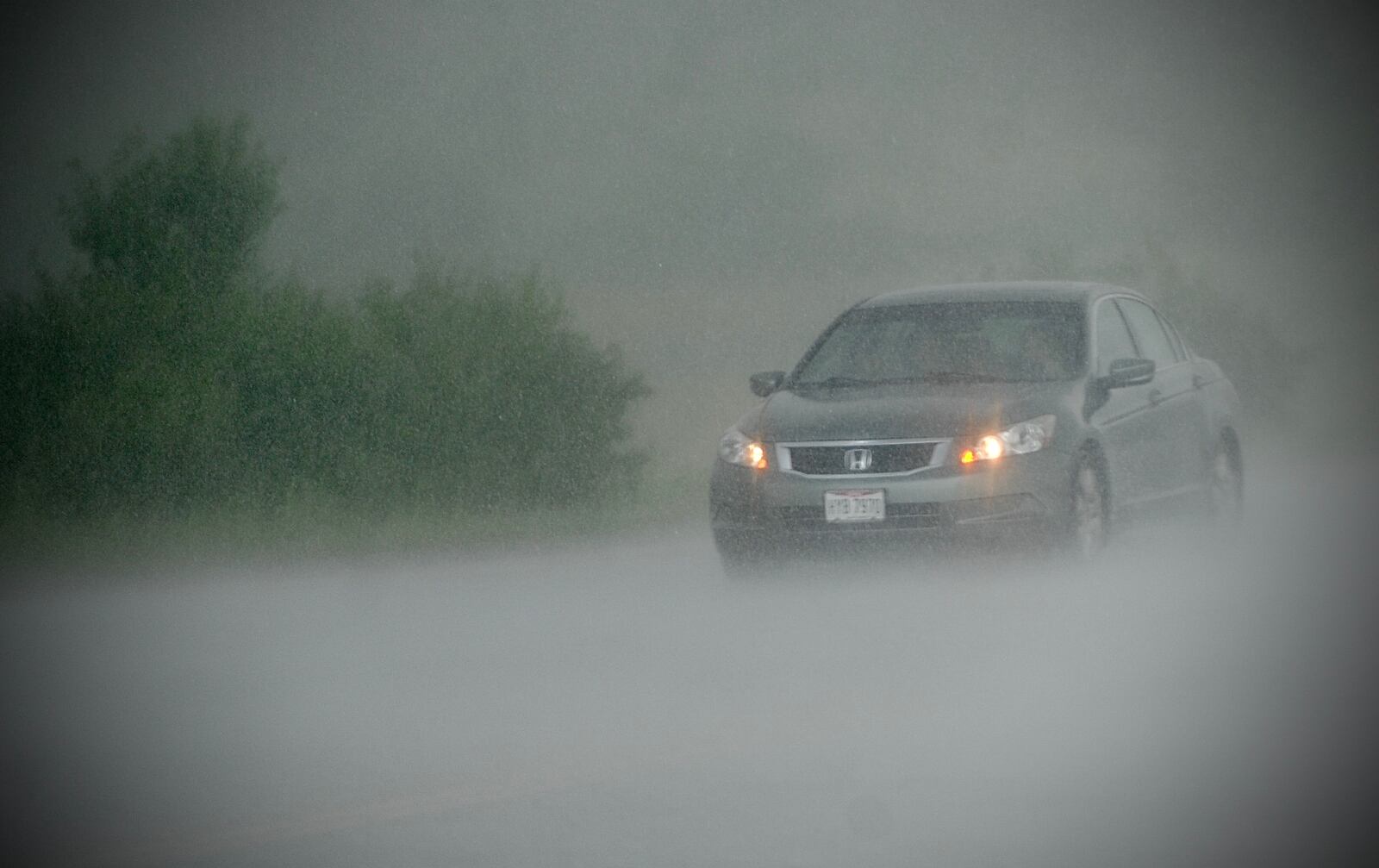 Heavy rain and strong winds hit the Fairborn area Tuesday afternoon causing branches to come down. MARSHALL GORBY\STAFF