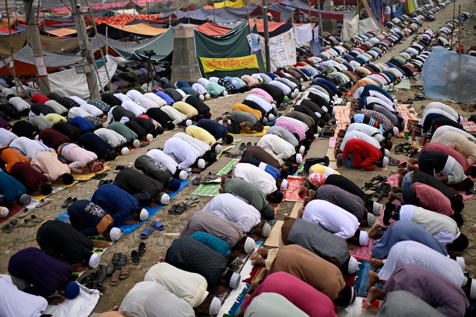 Muslim devotees prayer during the first phase of the three-day Biswa Ijtema, or the World Congregation of Muslims, at the banks of the Turag river in Tongi, near Dhaka, Bangladesh, Friday, Jan. 31, 2025. (AP Photo/Mahmud Hossain Opu)