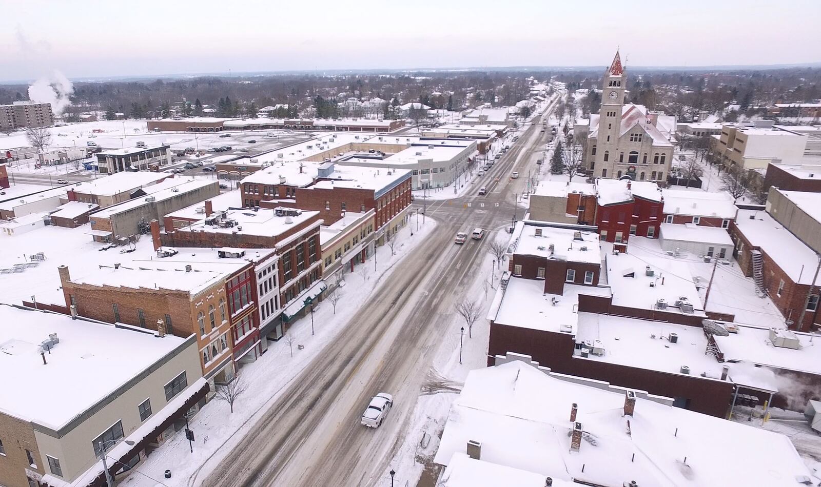 Aerial view of downtown Xenia looking north on Detroit Street.  Snow fell across the Miami Valley from Sunday night into Monday night closing churches, schools and businesses into Tuesday.   TY GREENLEES / STAFF