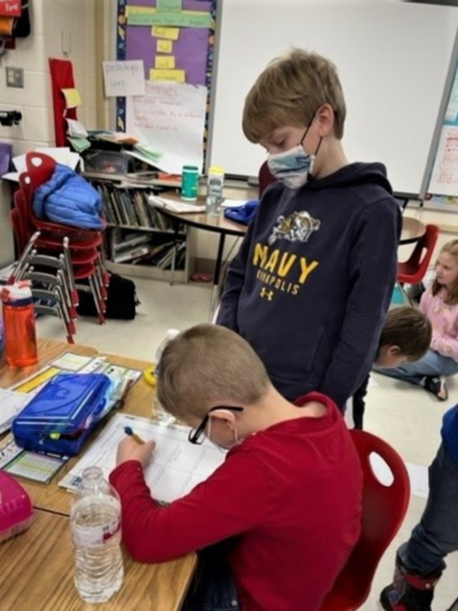 Second graders at Parkwood Elementary School in Beavercreek practice interviewing one another for a school newspaper project. CONTRIBUTED