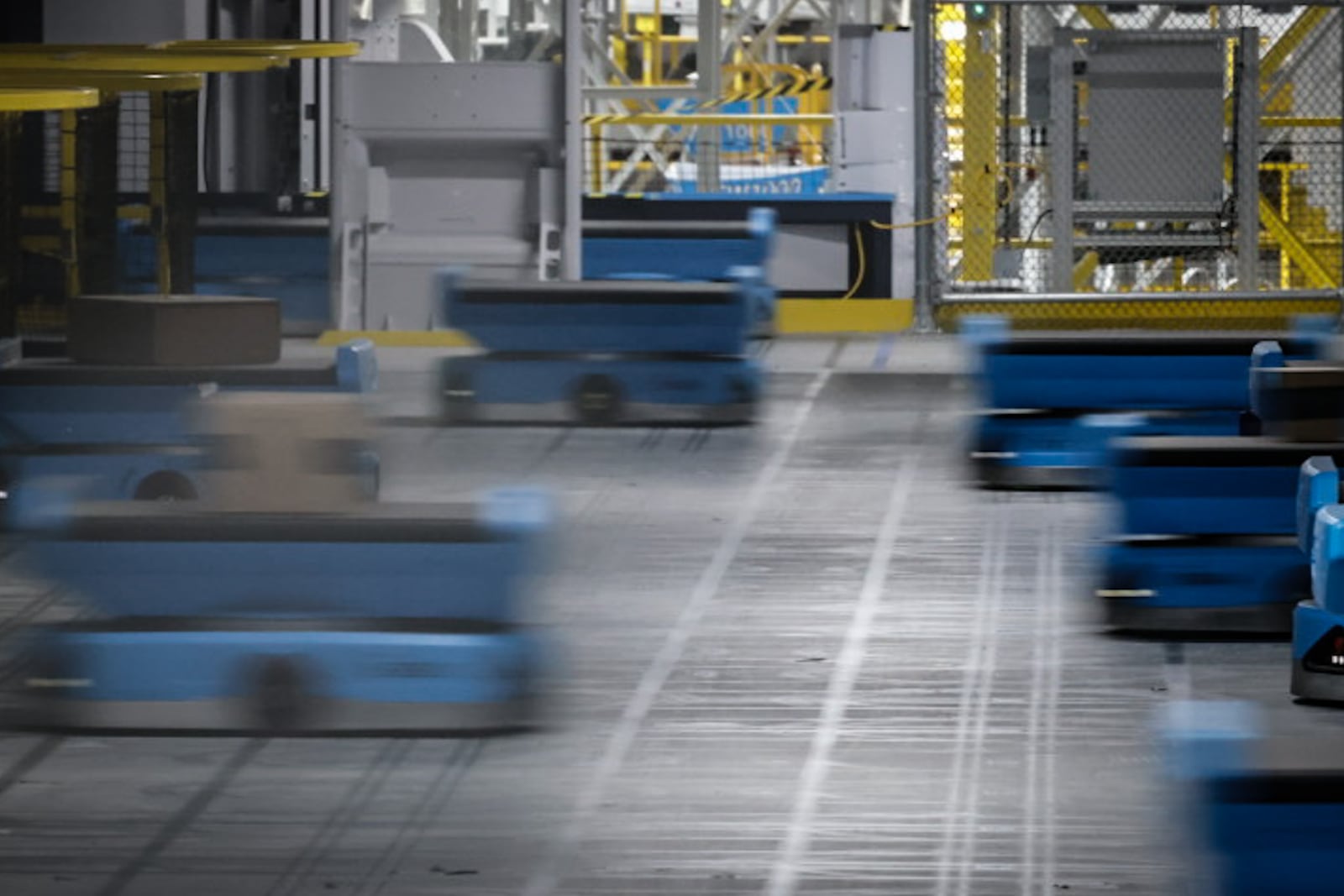 The Amazon Union Fulfillment Center uses robotics to help fill thousands of product orders. JIM NOELKER/STAFF